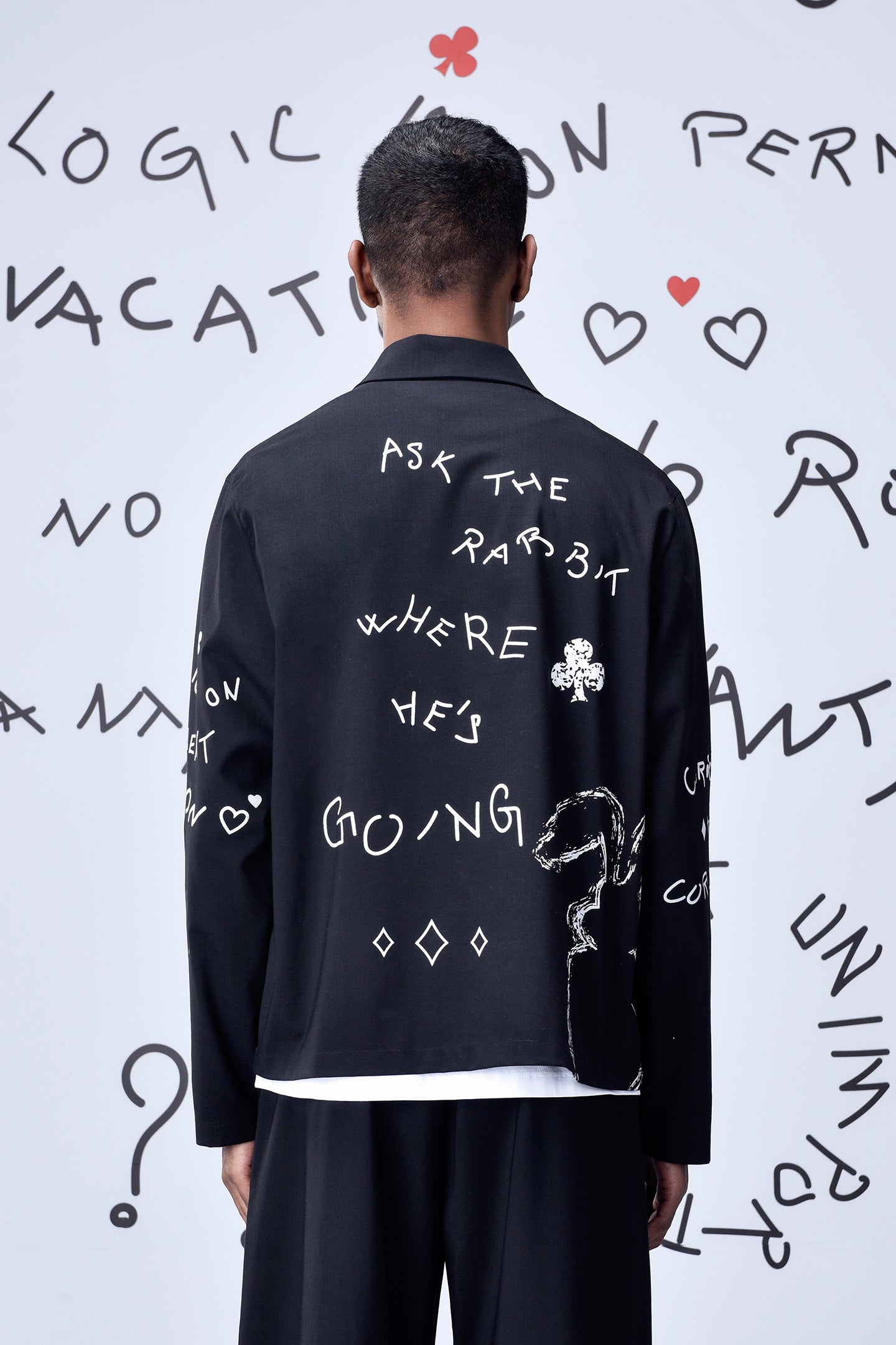 Black casual wool jacket men by Stylera with white graphic text and designs on back