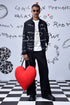 Black casual wool jacket men by Stylera worn with graphic white shirt and black pants