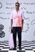 Stylera pink relaxed fit shirt for men styled with black pants and striped tote bag