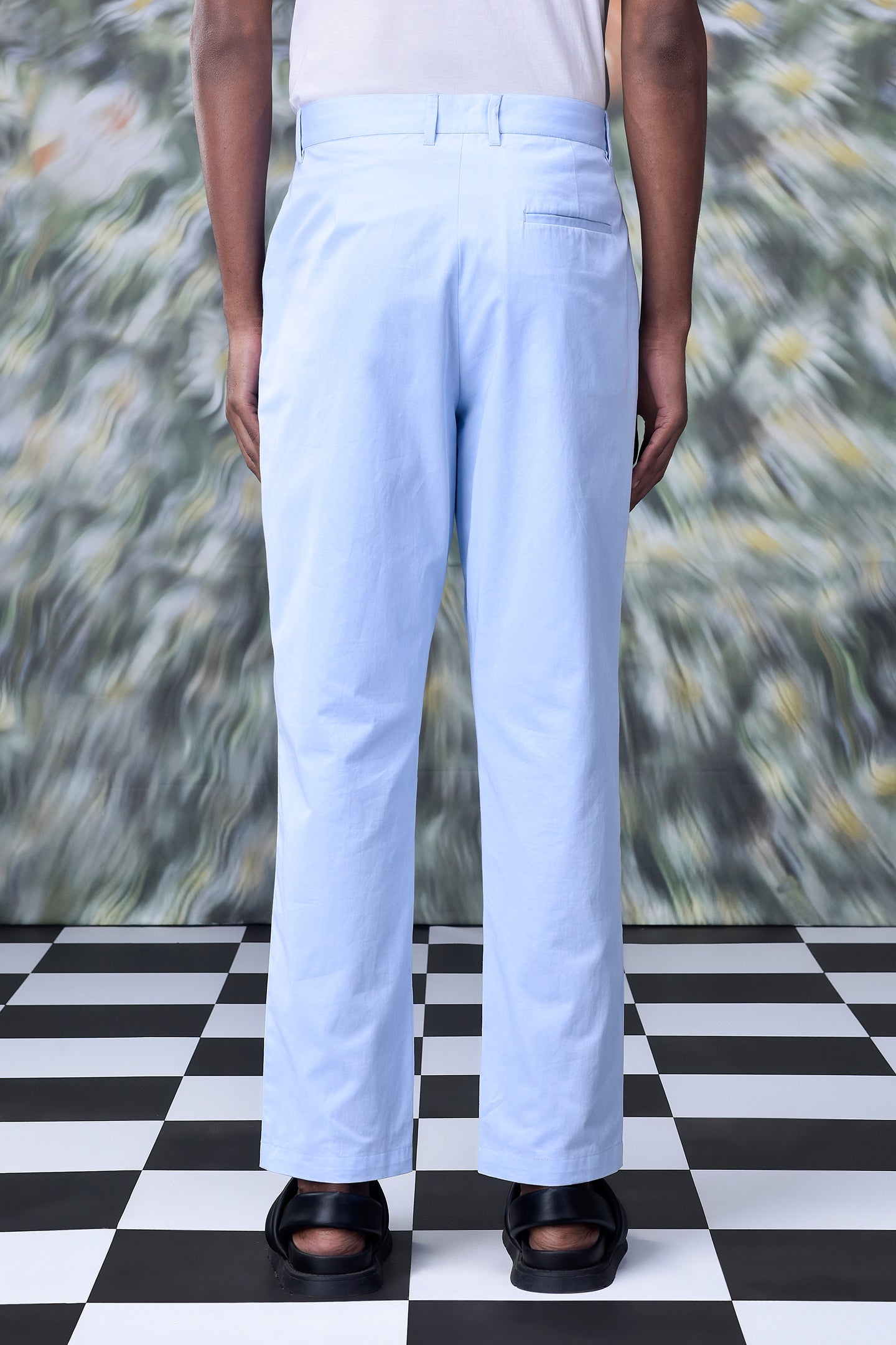 Light blue regular fit men's pants from Stylera shown from the back