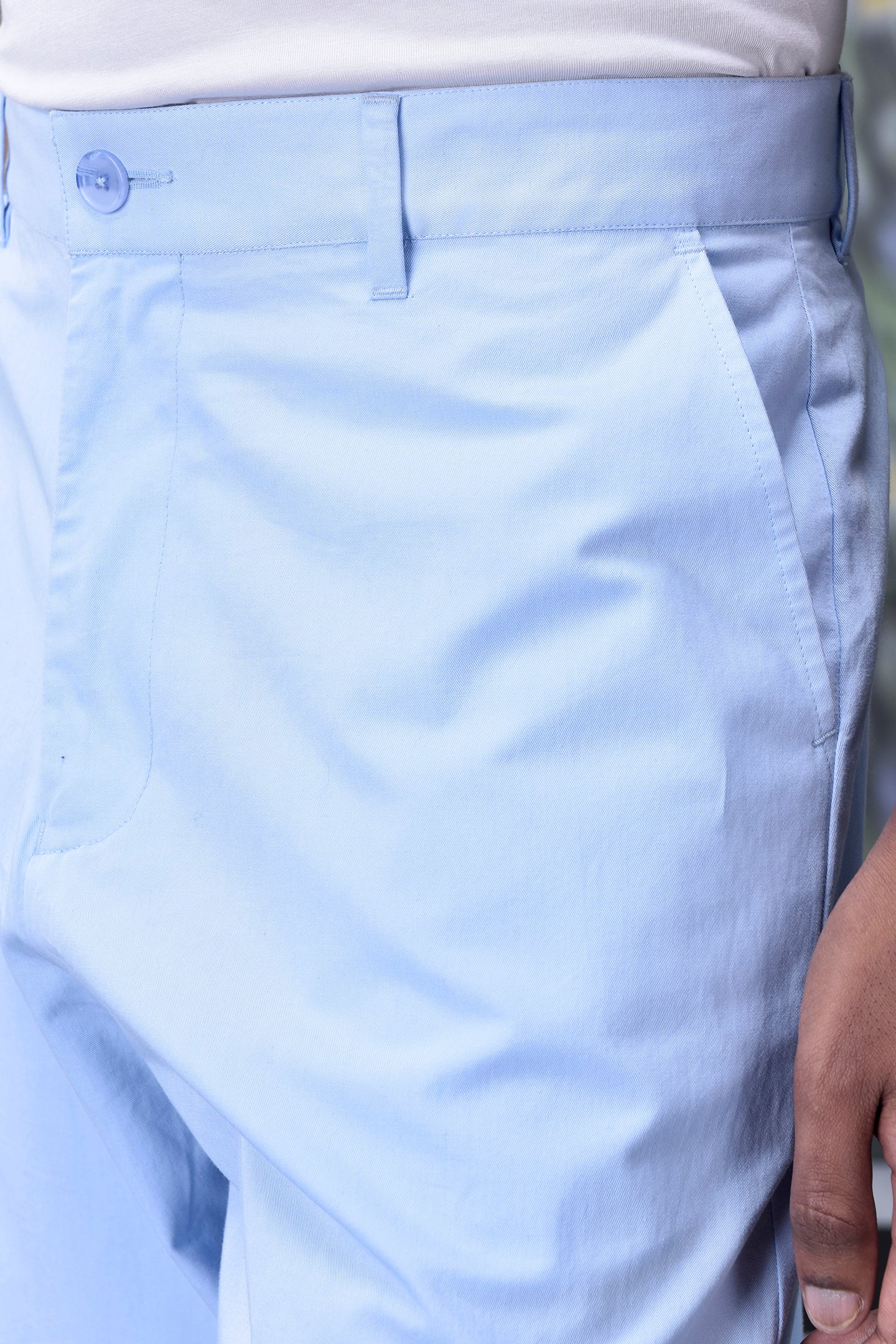 Light blue regular fit men's pants from Stylera with button and side pockets