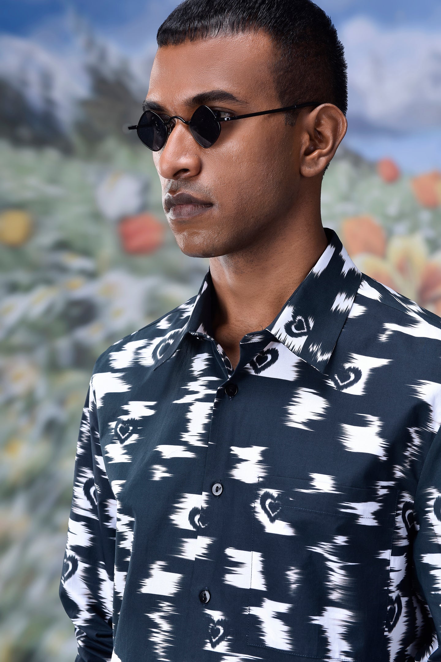 Man wearing trendy printed shirts for men with black and white abstract pattern by Stylera