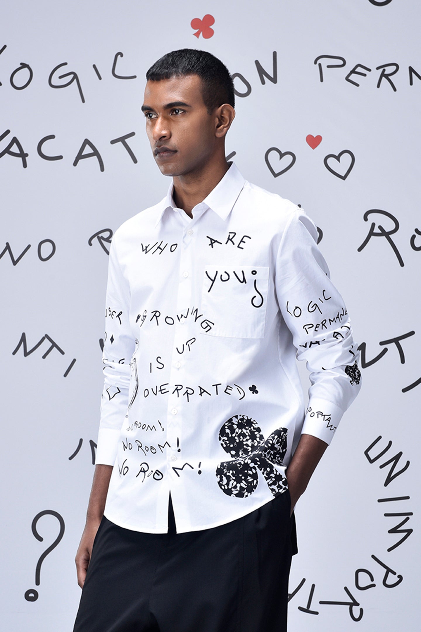 Stylera trendy scribble print shirt worn by male model with black pants