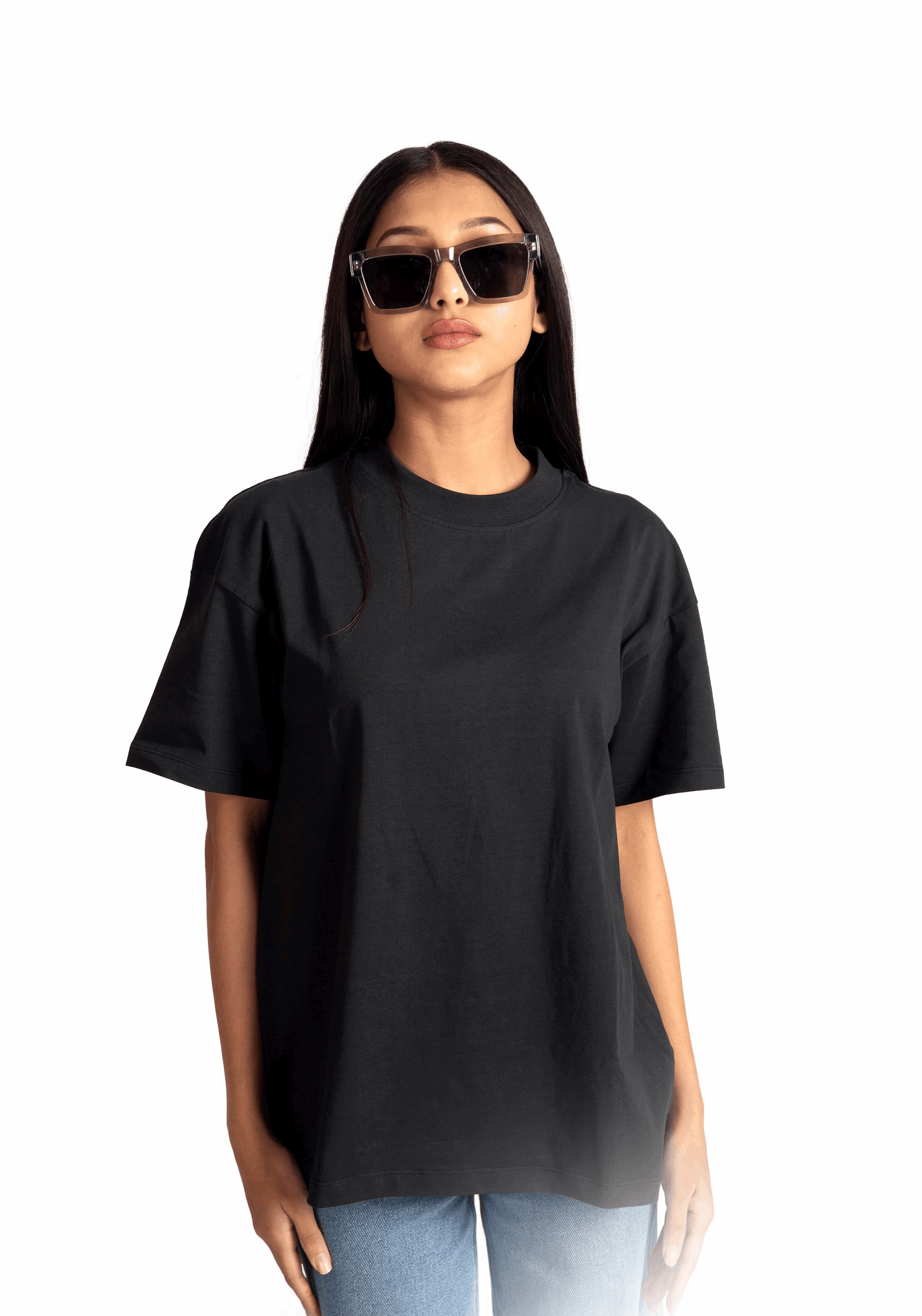 Stylera women's relaxed fit black tee modeled with sunglasses and casual blue jeans