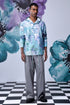 Stylera artistic print hoodie shirt pastel watercolor floral hoodie on male model with gray trousers