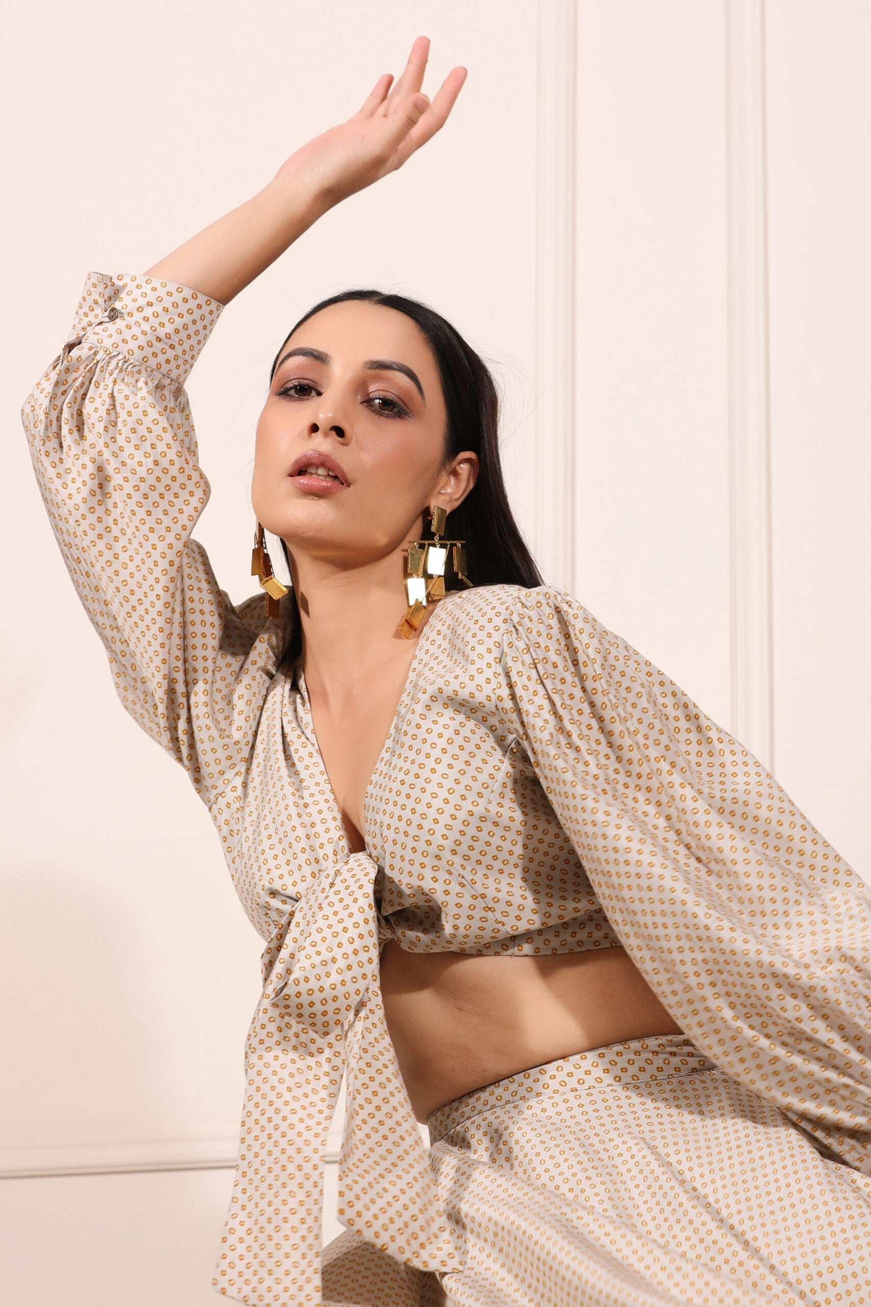 Model showcasing Bindu Starlight co-ord set with tie-front crop top and flowing skirt