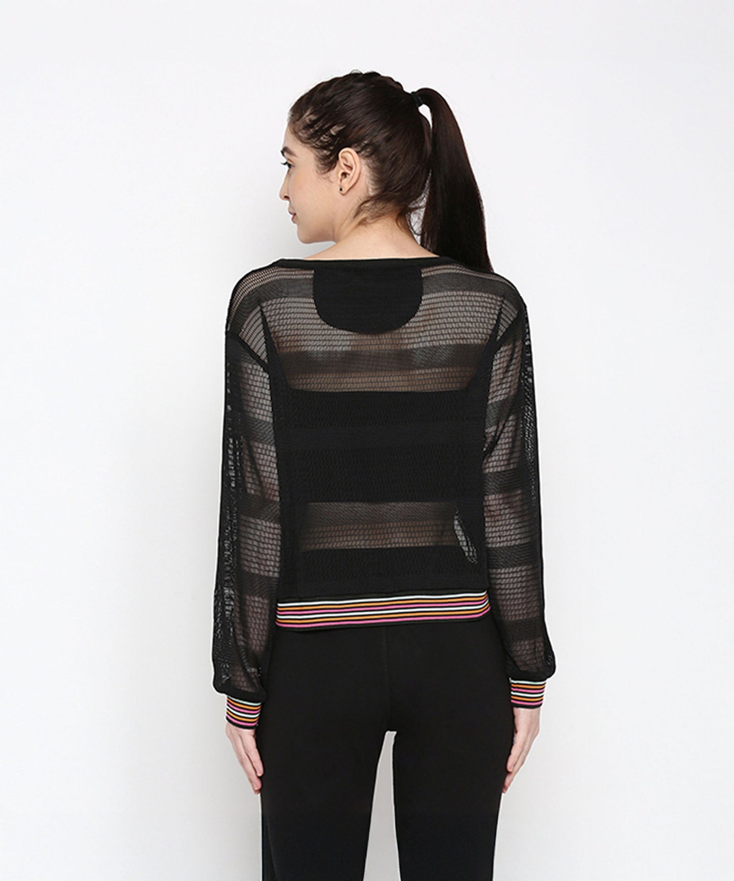 Back view of a stylish black netted top for women with long sleeves and striped hem