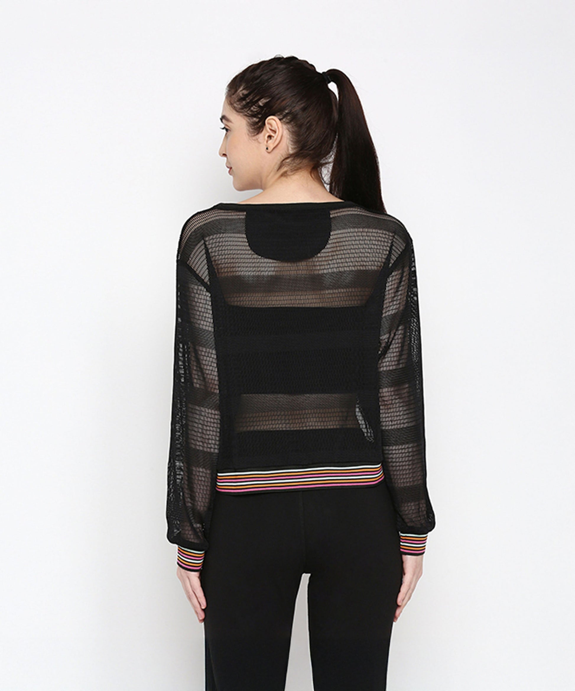 Back view of a stylish black netted top for women with long sleeves and striped hem