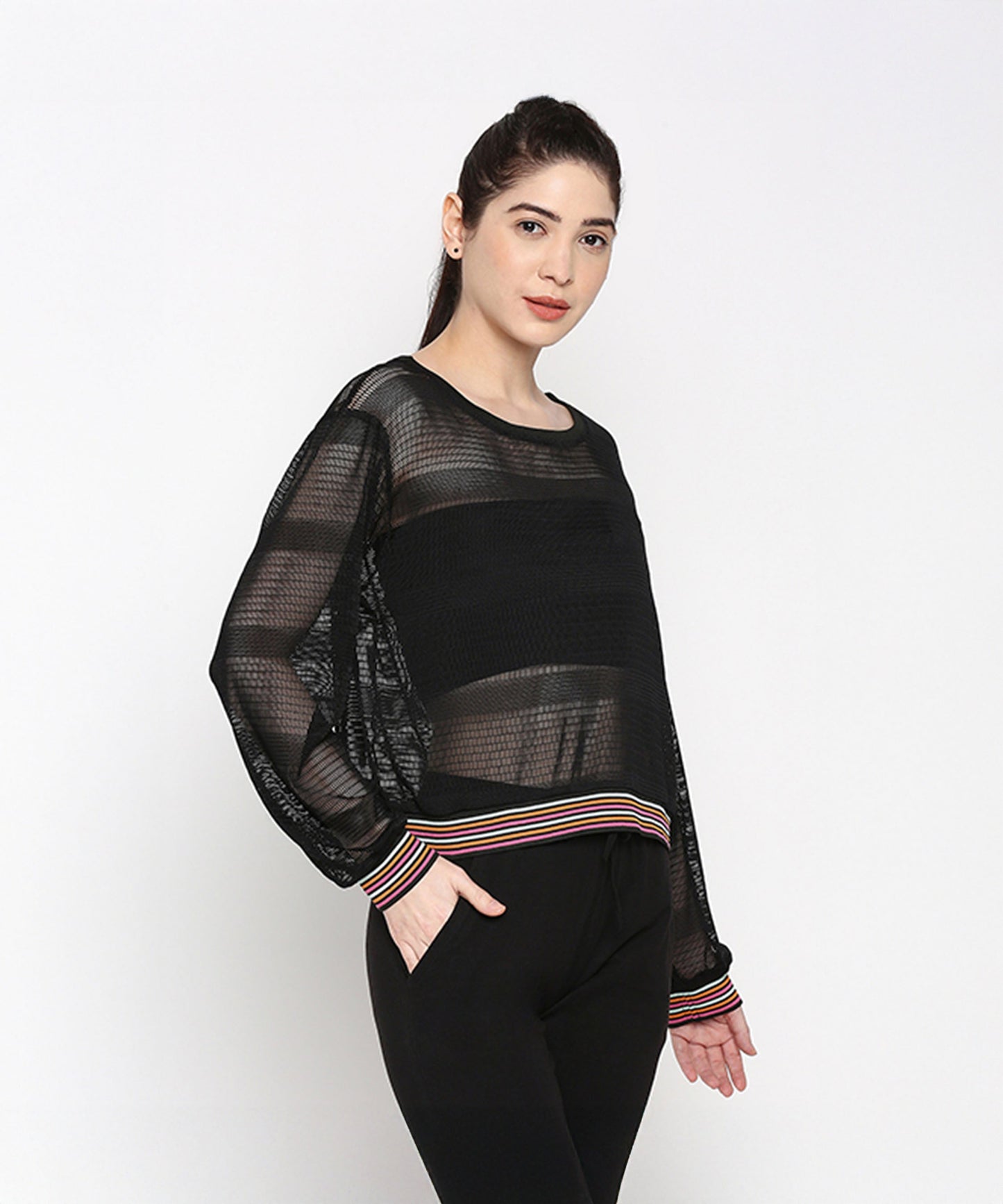 Stylish black netted top for women with colorful striped cuffs and loose fit