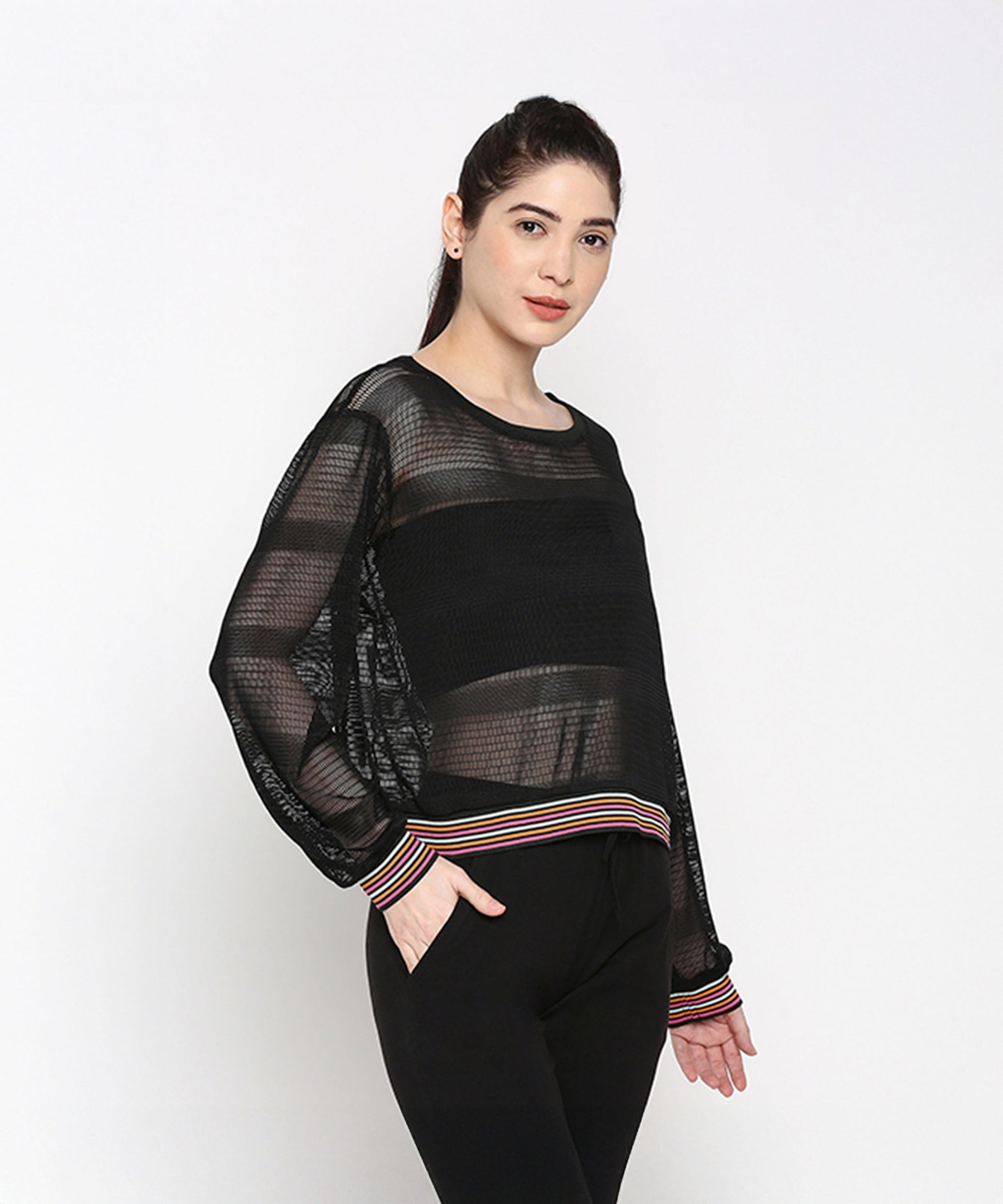 Stylish black netted top for women with colorful striped cuffs and loose fit