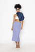 Stylera blue button front midi skirt worn with white crop top and navy scarf