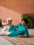 Stylish blue Jodhpuri kurta for men showcased in a modern setting with a relaxed pose