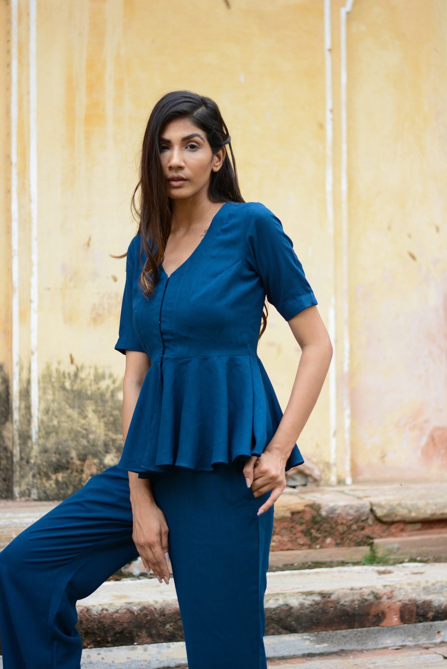 Yale blue peplum co-ord set featuring a stylish top and matching trousers for a chic ensemble