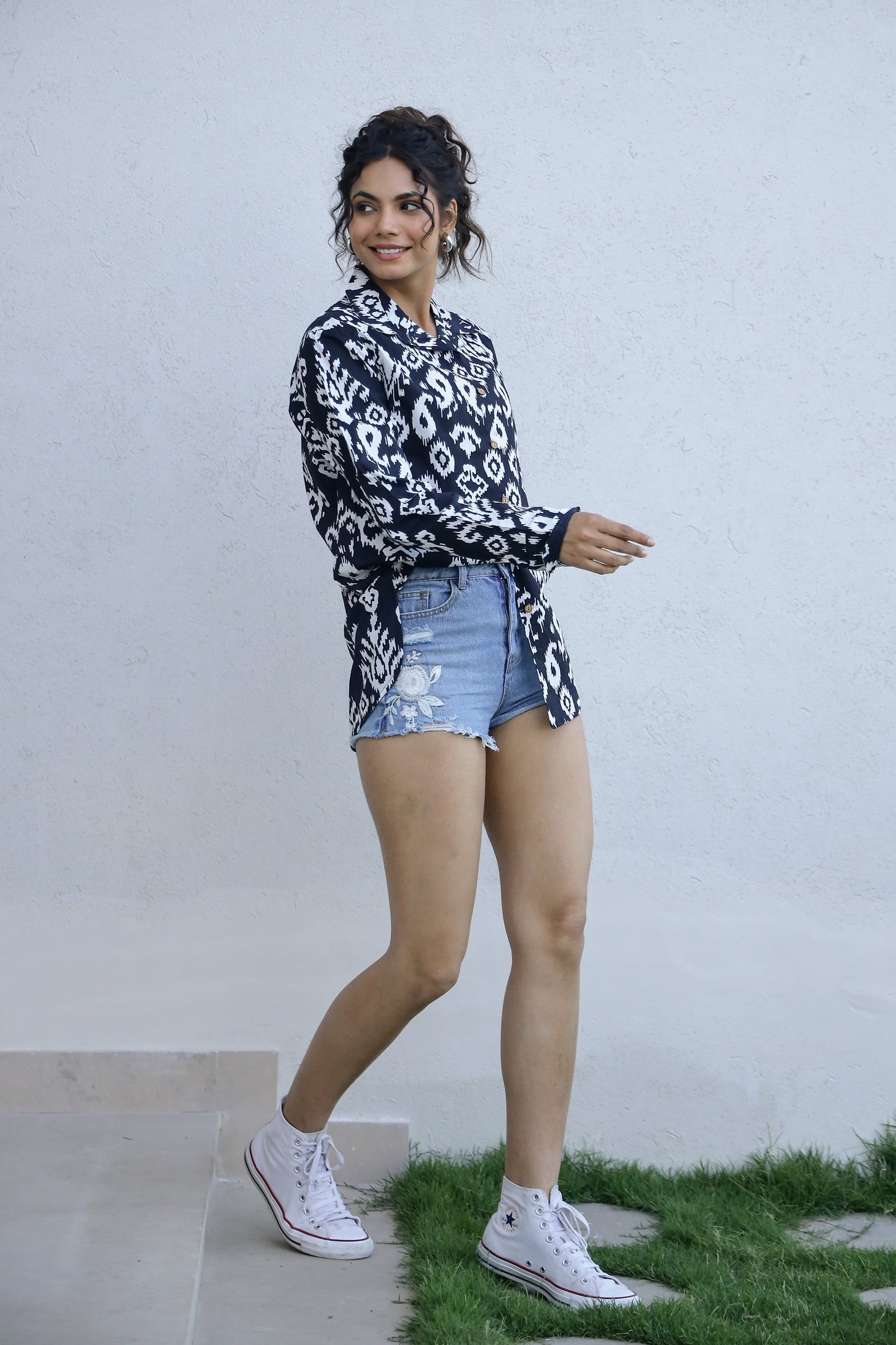 Stylera casual boho shirt for women paired with denim shorts and sneakers for a trendy look