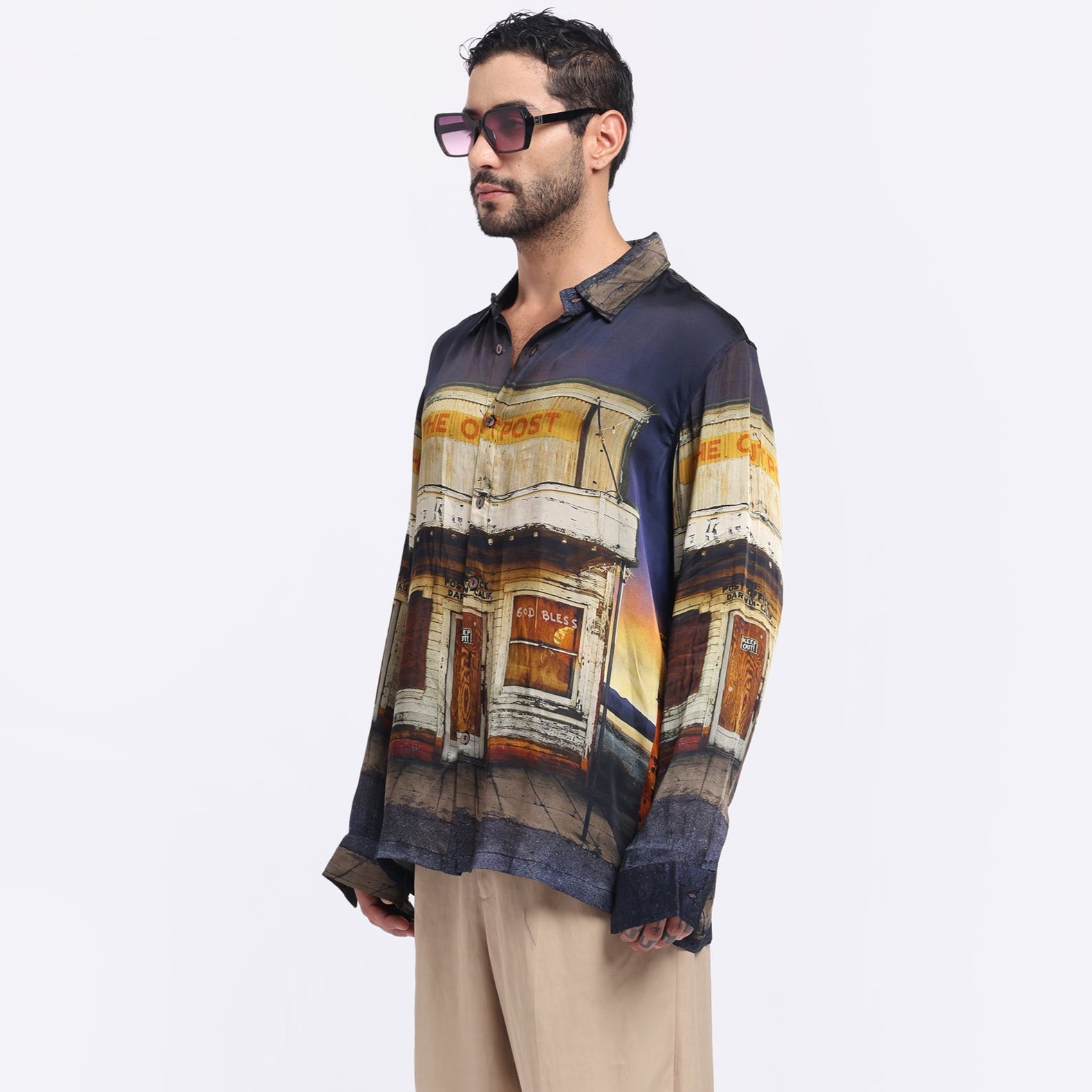 Stylera casual statement shirts for men featuring a vibrant print of a post office in sunset colors