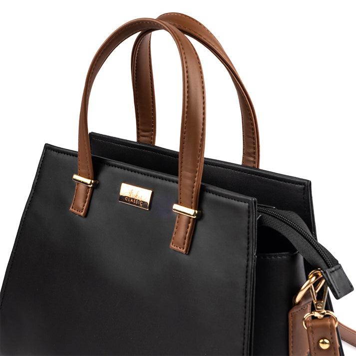 Stylish charcoal caramel handbag with dual handles and a sleek design for everyday use