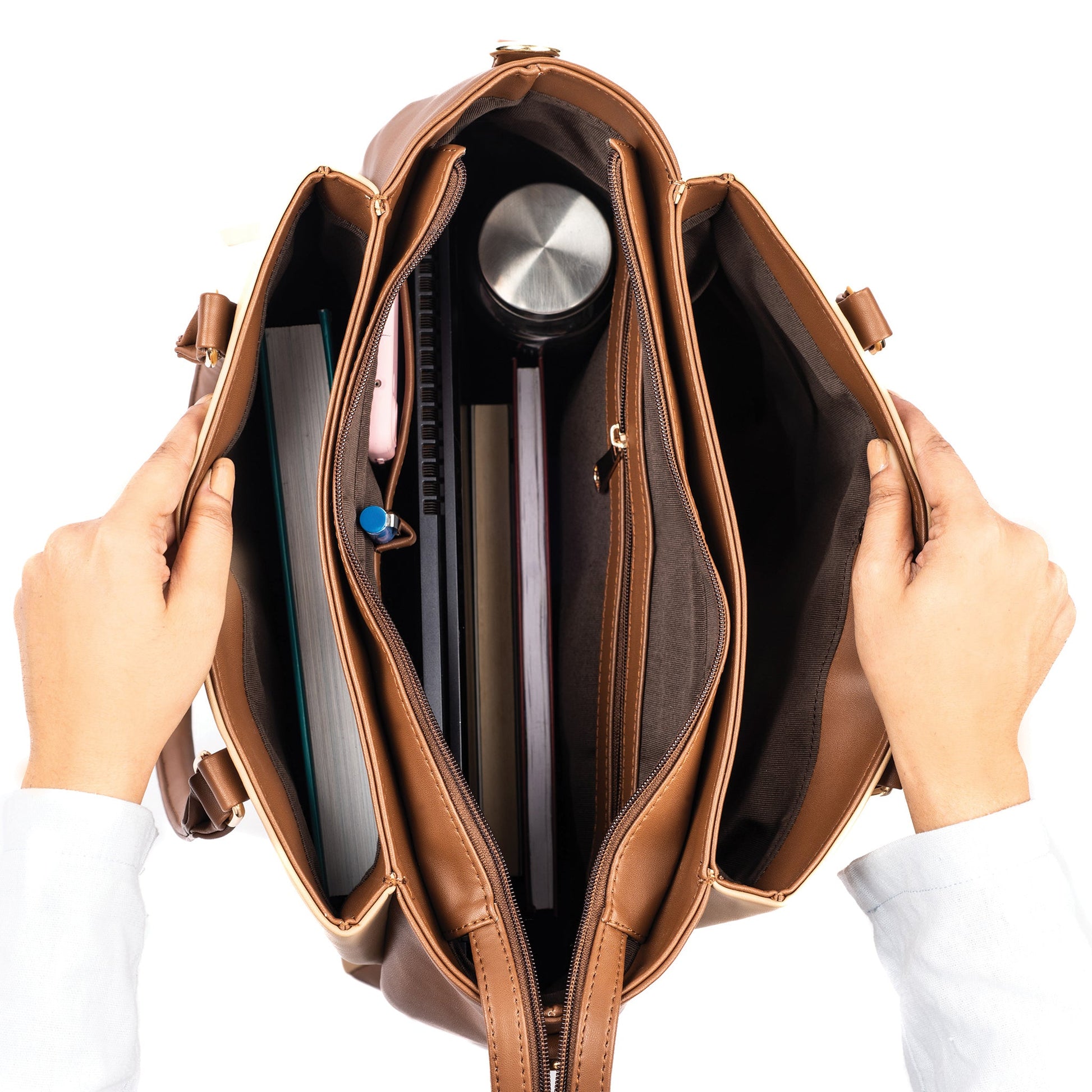 Aspire cinnamon cocoa tote bag showing spacious interior with compartments for books and a water bottle