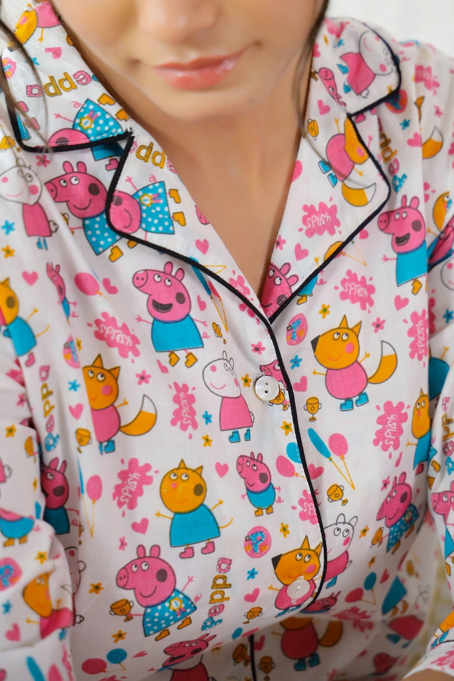Cute cotton nightwear for women featuring playful cartoon character prints in vibrant colors