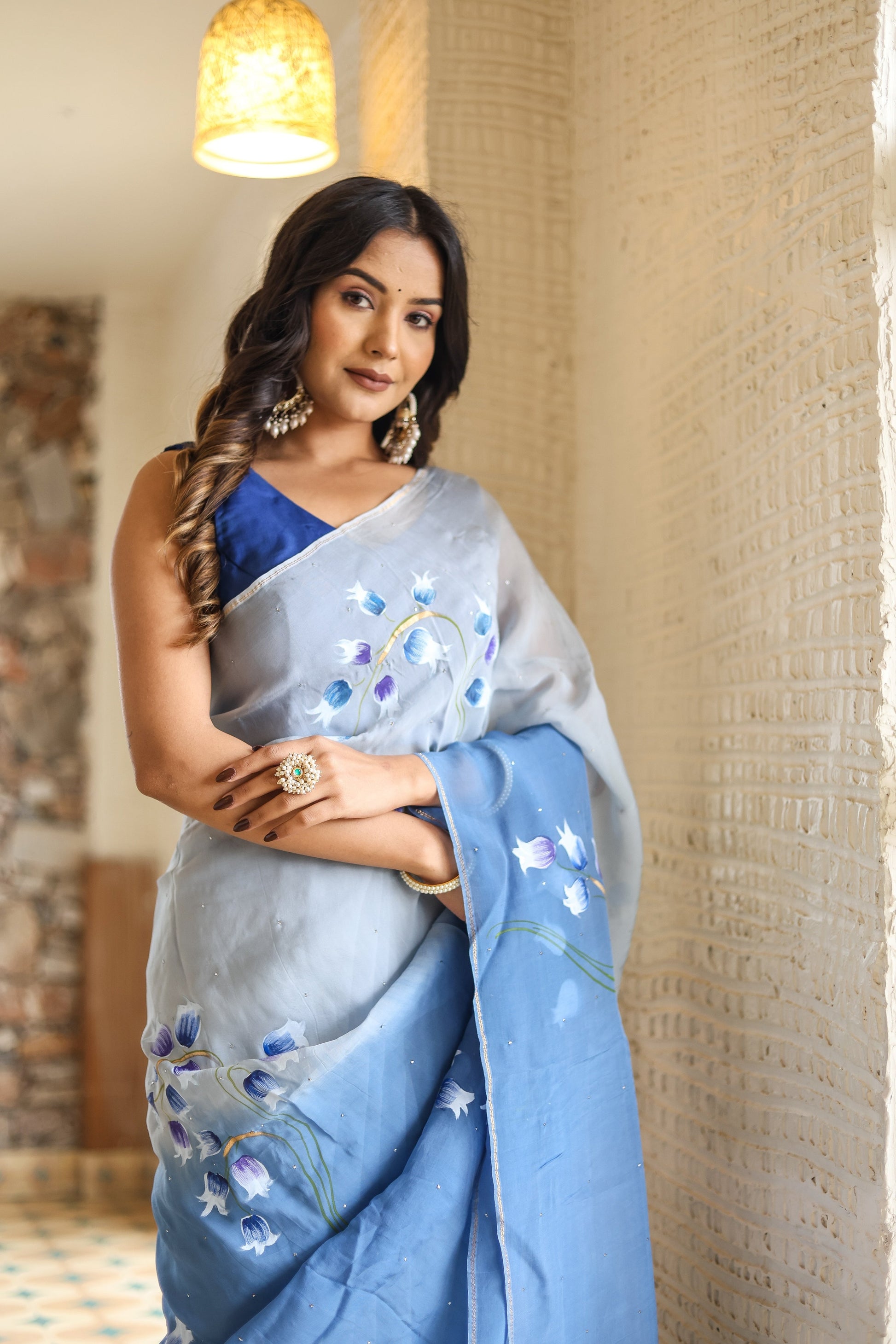 Elegant designer blue saree for women with floral embroidery, perfect for special occasions