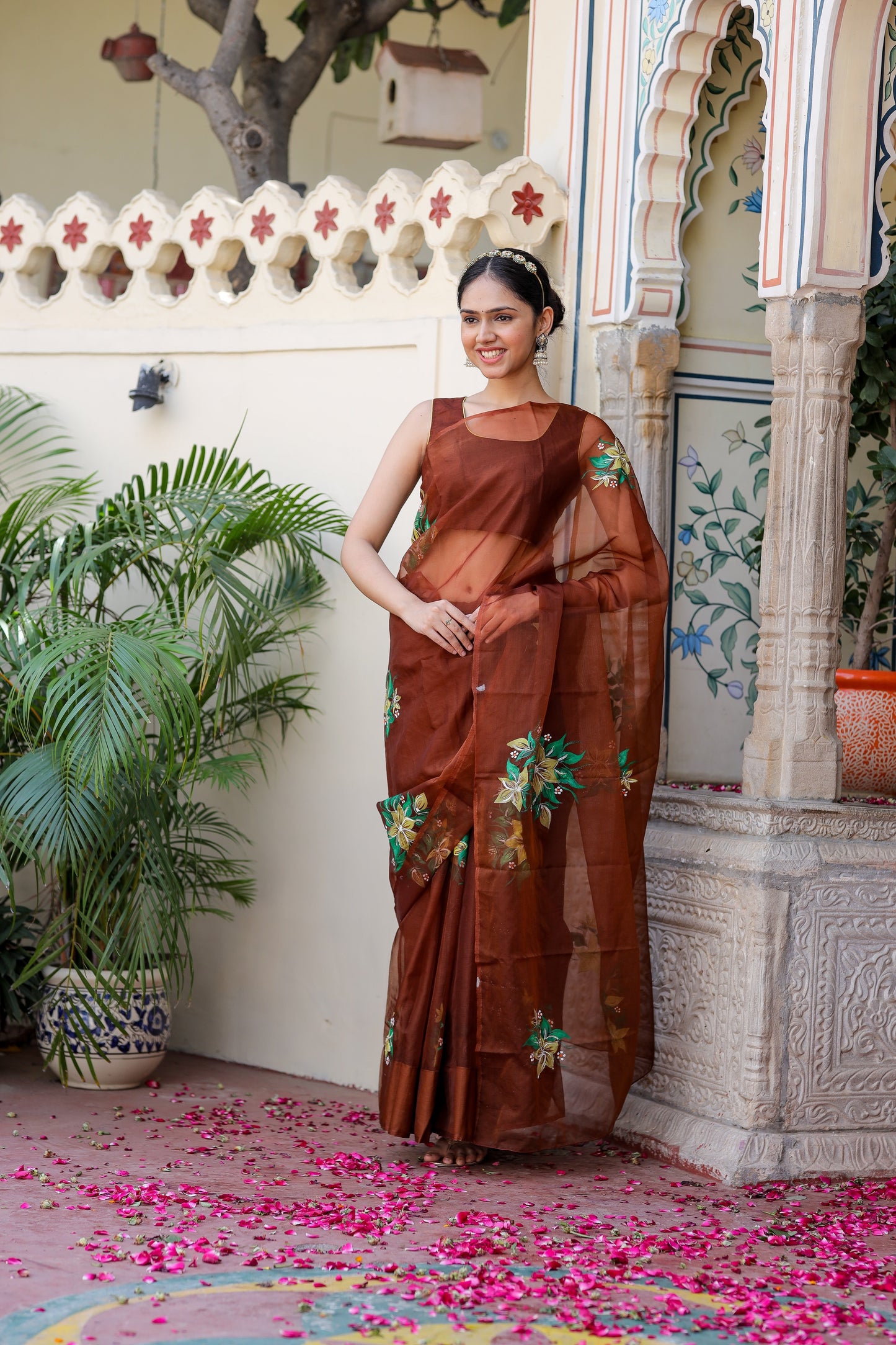 Elegant designer brown saree for wedding featuring floral embroidery and lightweight fabric