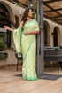 Elegant Stylera designer malmal saree with flowers in green, perfect for festive occasions