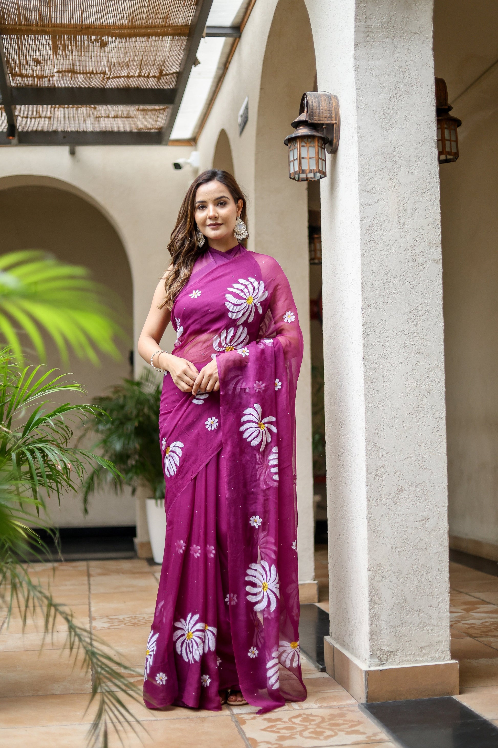 Elegant Stylera designer party wear saree for women in vibrant purple with floral patterns