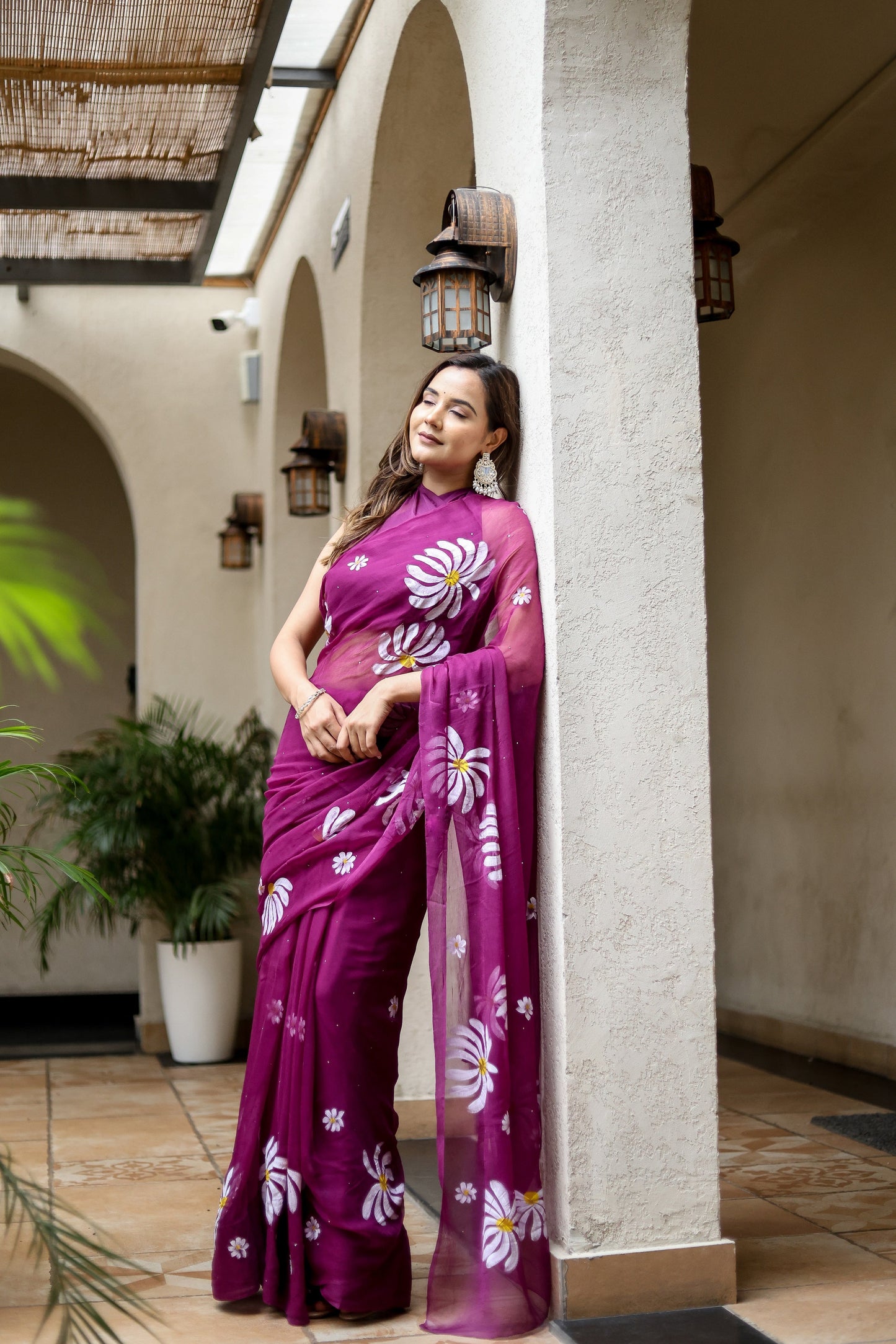 Elegant designer party wear saree for women in purple with floral embroidery and sheer pallu