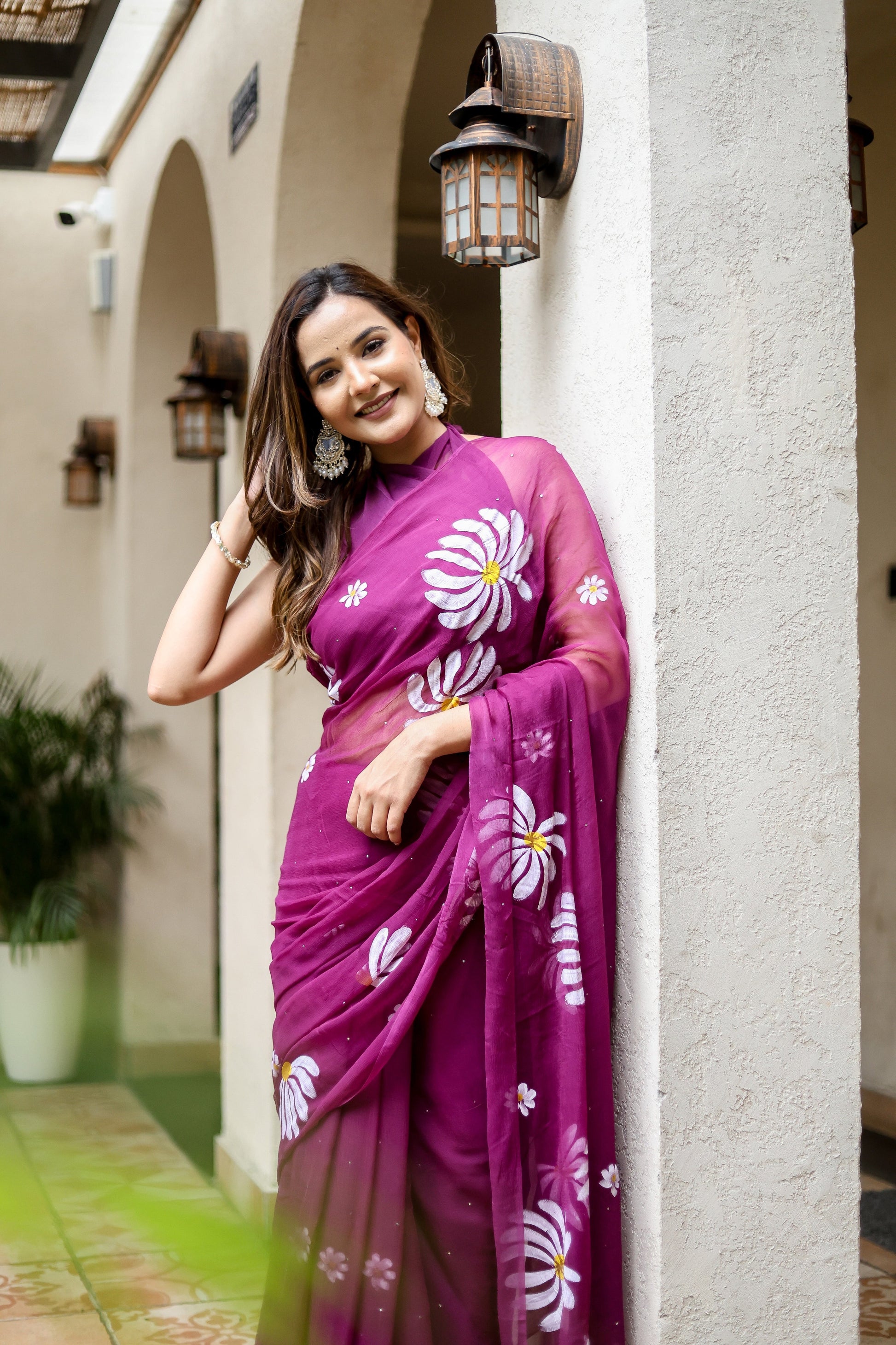 Elegant designer party wear saree for women in vibrant purple with floral embroidery