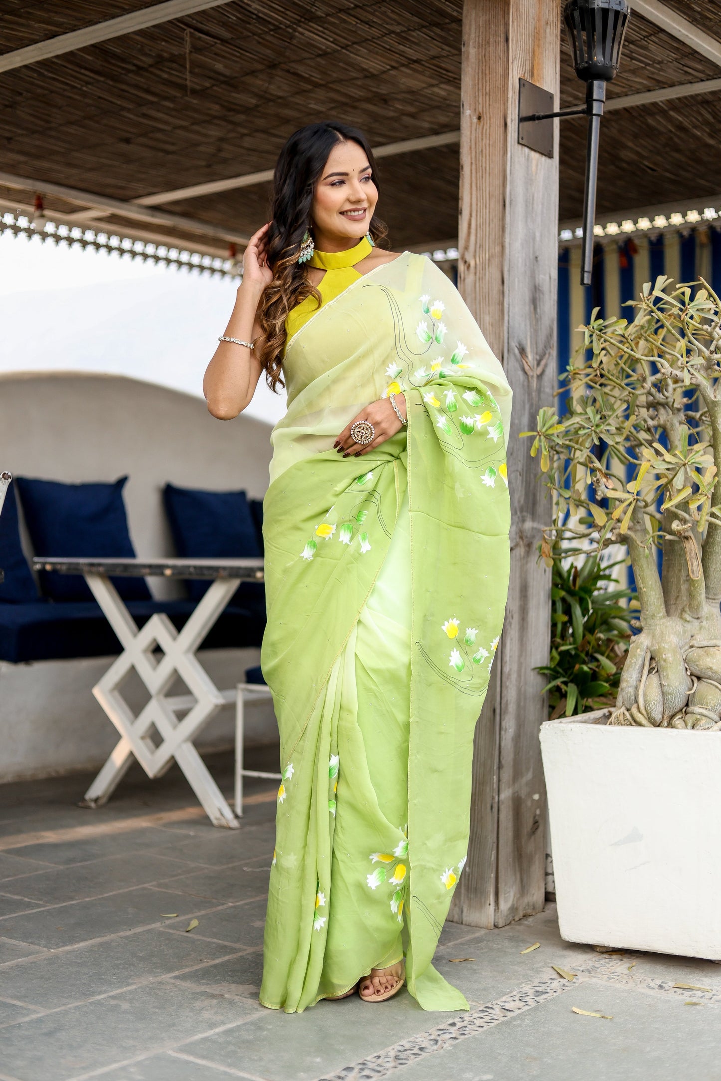 Elegant designer party wear saree in lime green with floral embroidery, perfect for festive occasions