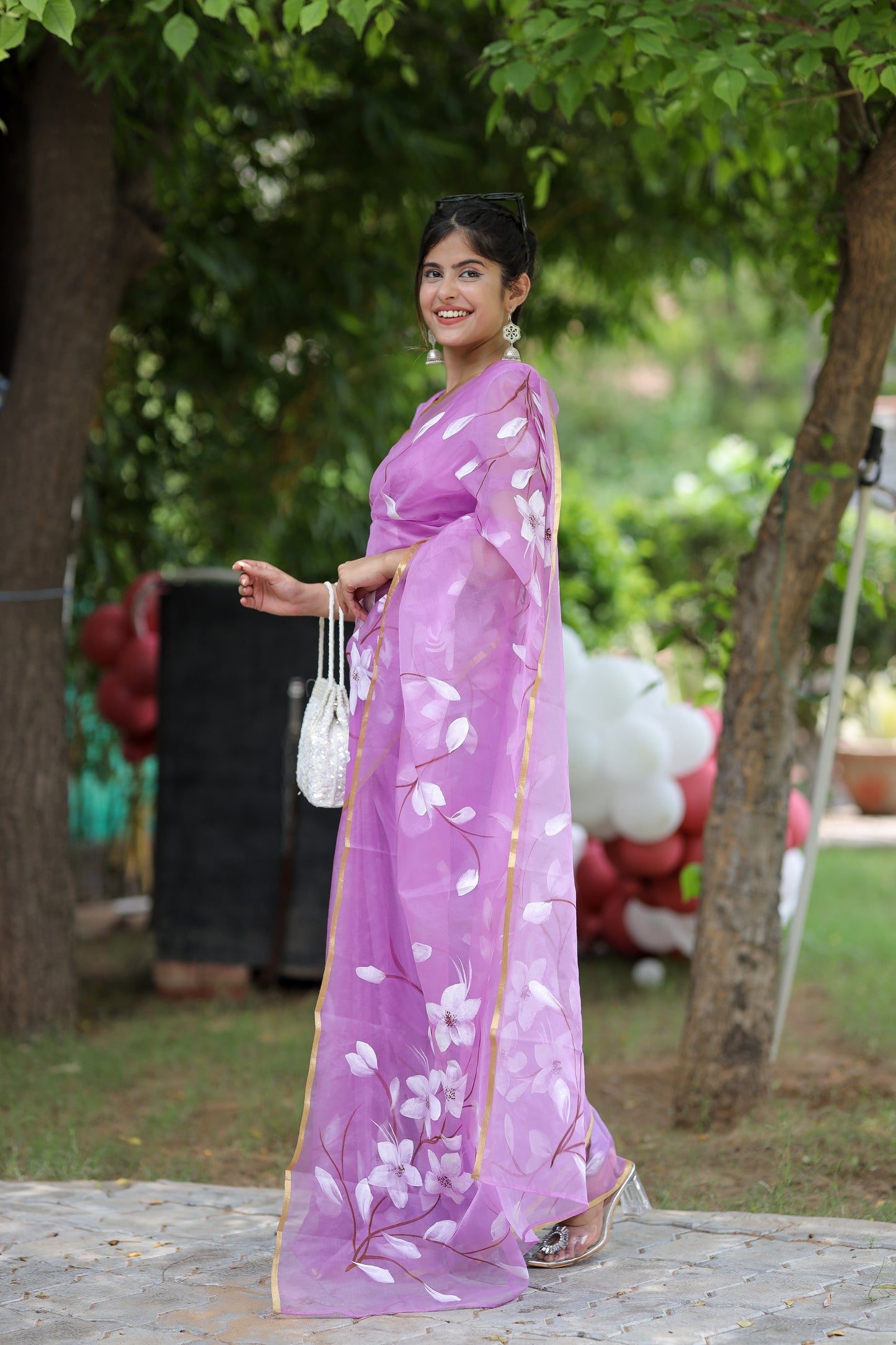 Elegant DiraByDimple designer saree for special occasions in vibrant purple with floral patterns
