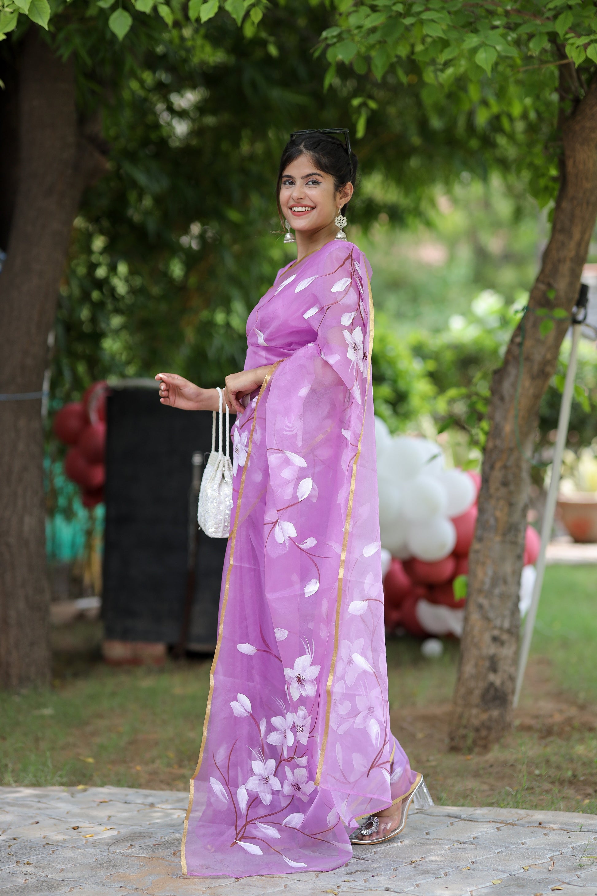 Elegant DiraByDimple designer saree for special occasions in vibrant purple with floral patterns