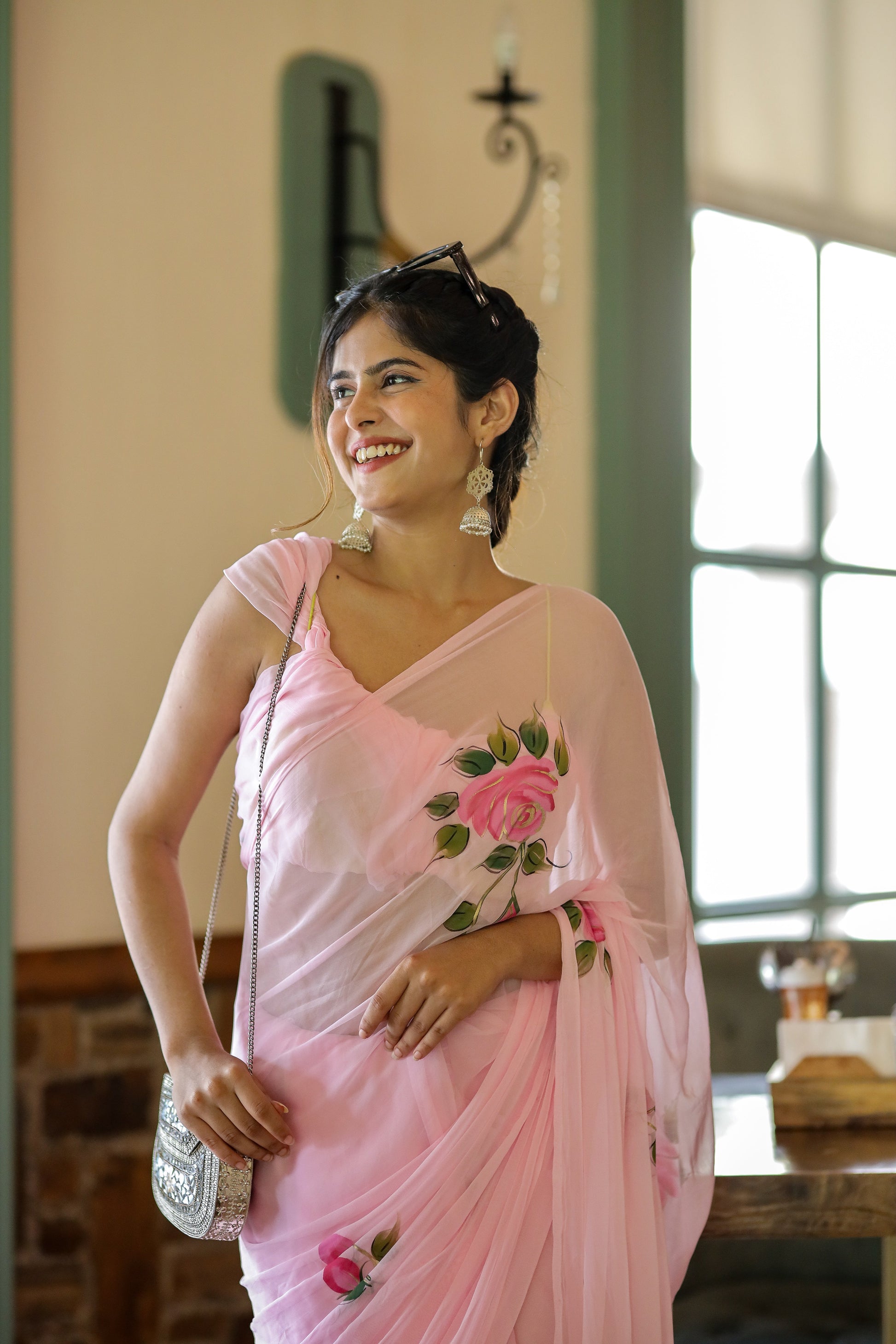 Elegant party wear chiffon saree in pink with floral embroidery, perfect for special occasions