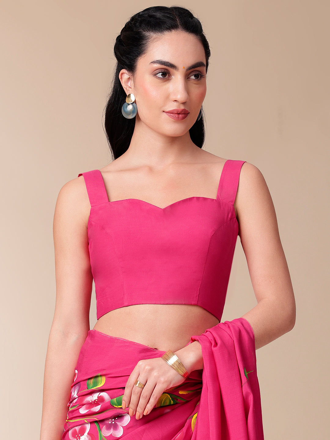 Elegant pink saree for parties with floral details and a matching blouse for fashionable occasions