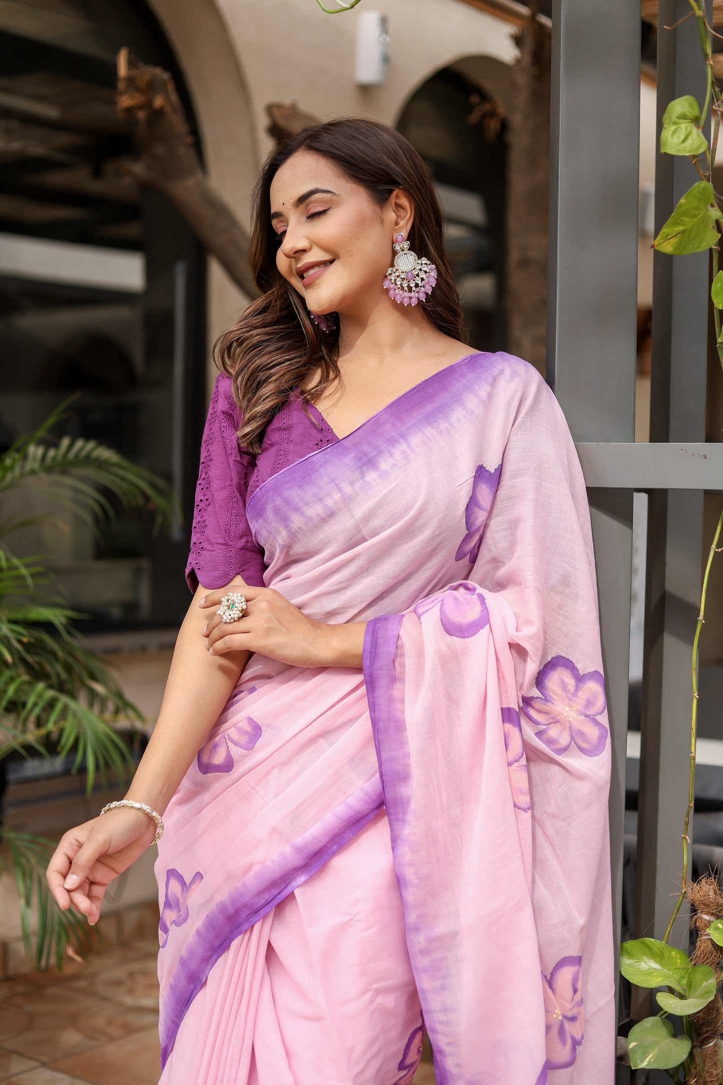 Elegant Stylera exclusive designer saree for parties in soft pink with floral designs