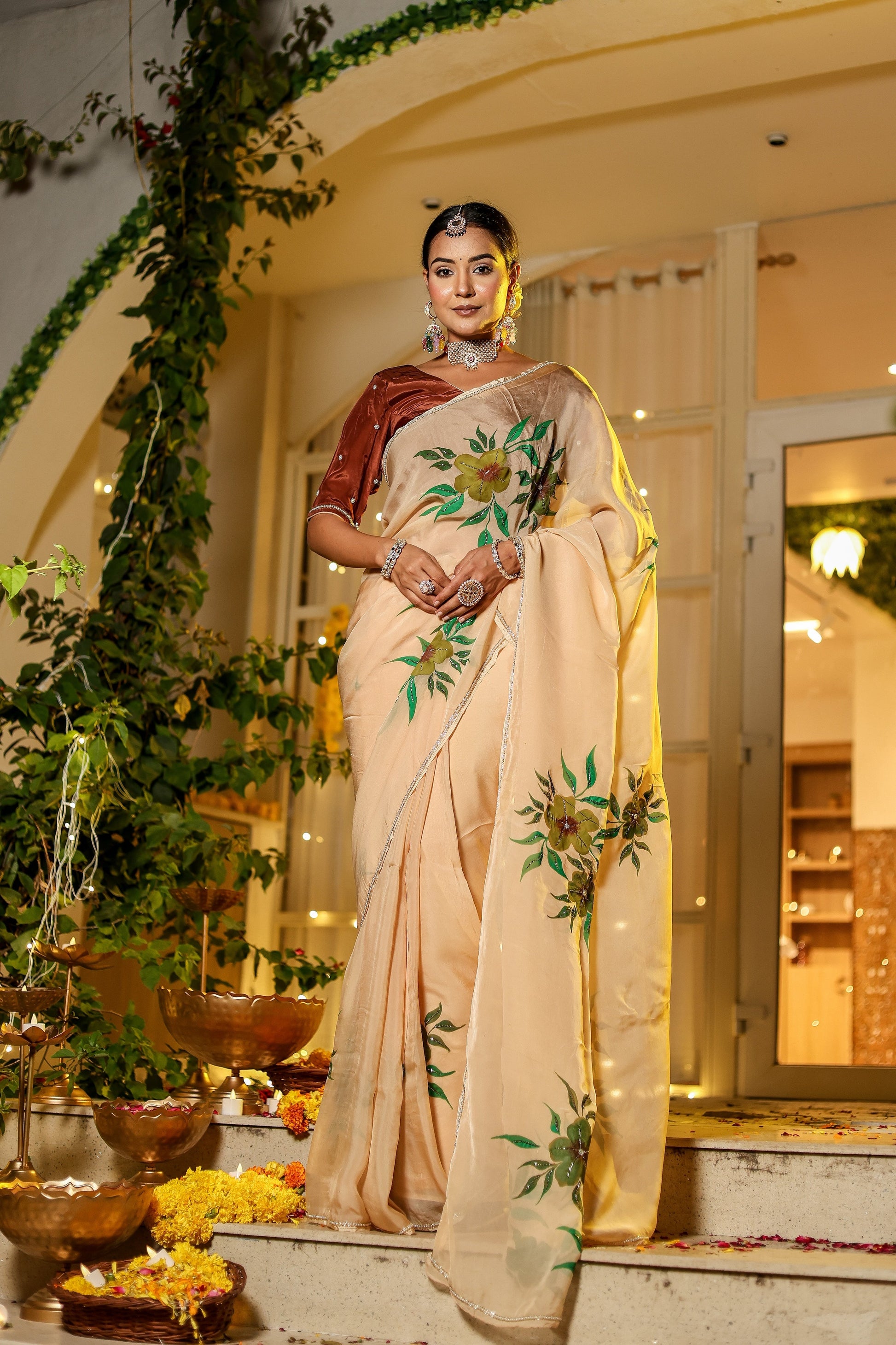 Elegant exclusive handmade Indian saree with floral patterns, perfect for festive occasions and celebrations