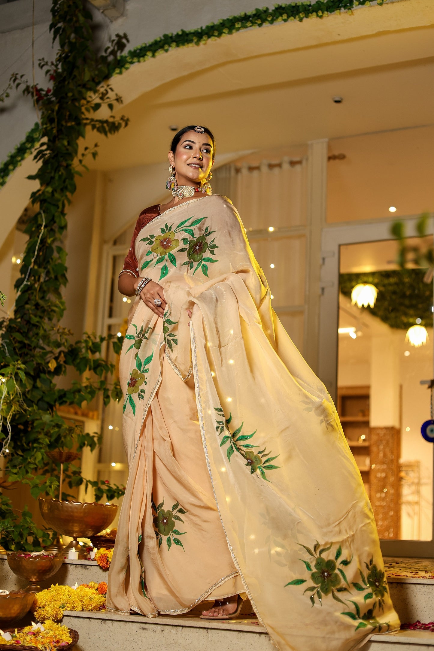 Elegant model wearing an exclusive handmade Indian saree with floral embroidery, perfect for festive occasions