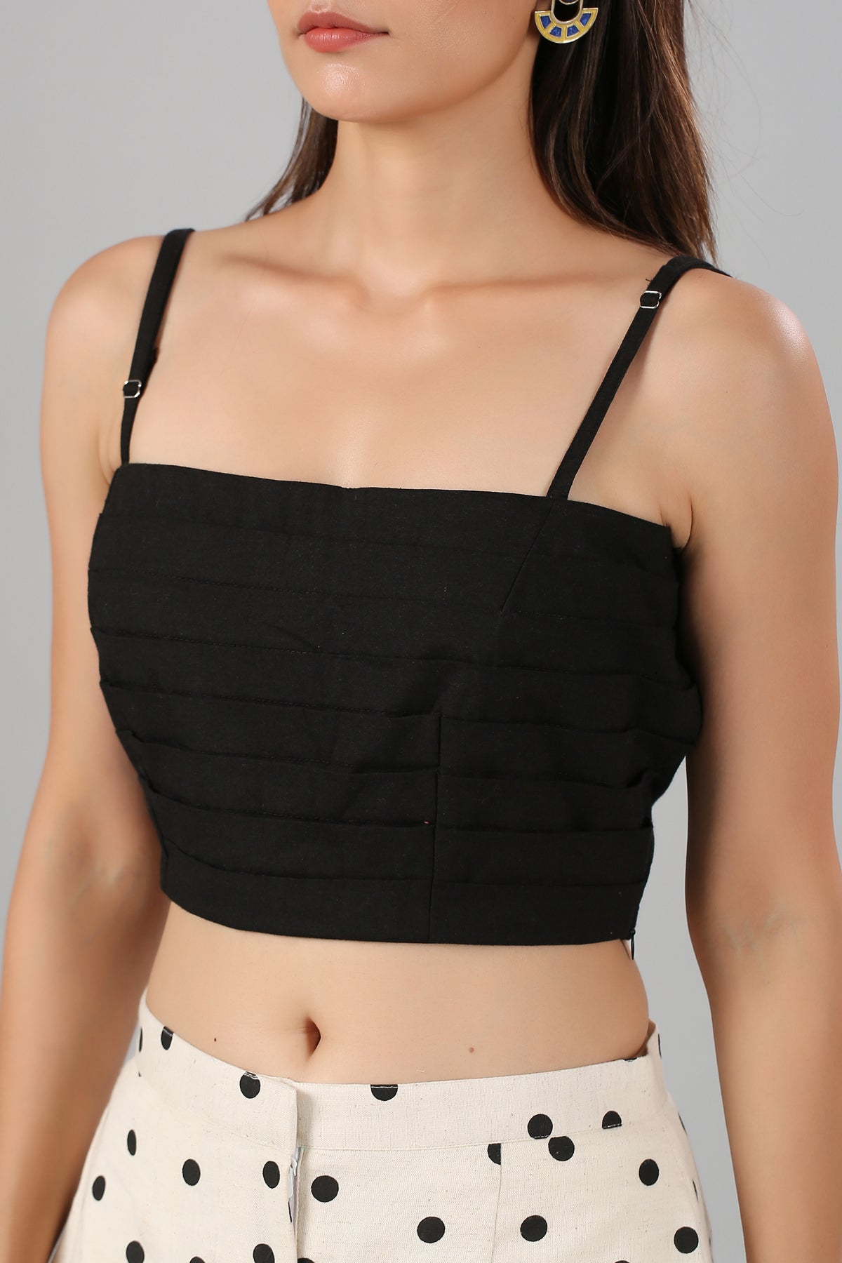 Black cropped strappy top with horizontal pleats and polka dot skirt fashionable two piece suit for ladies