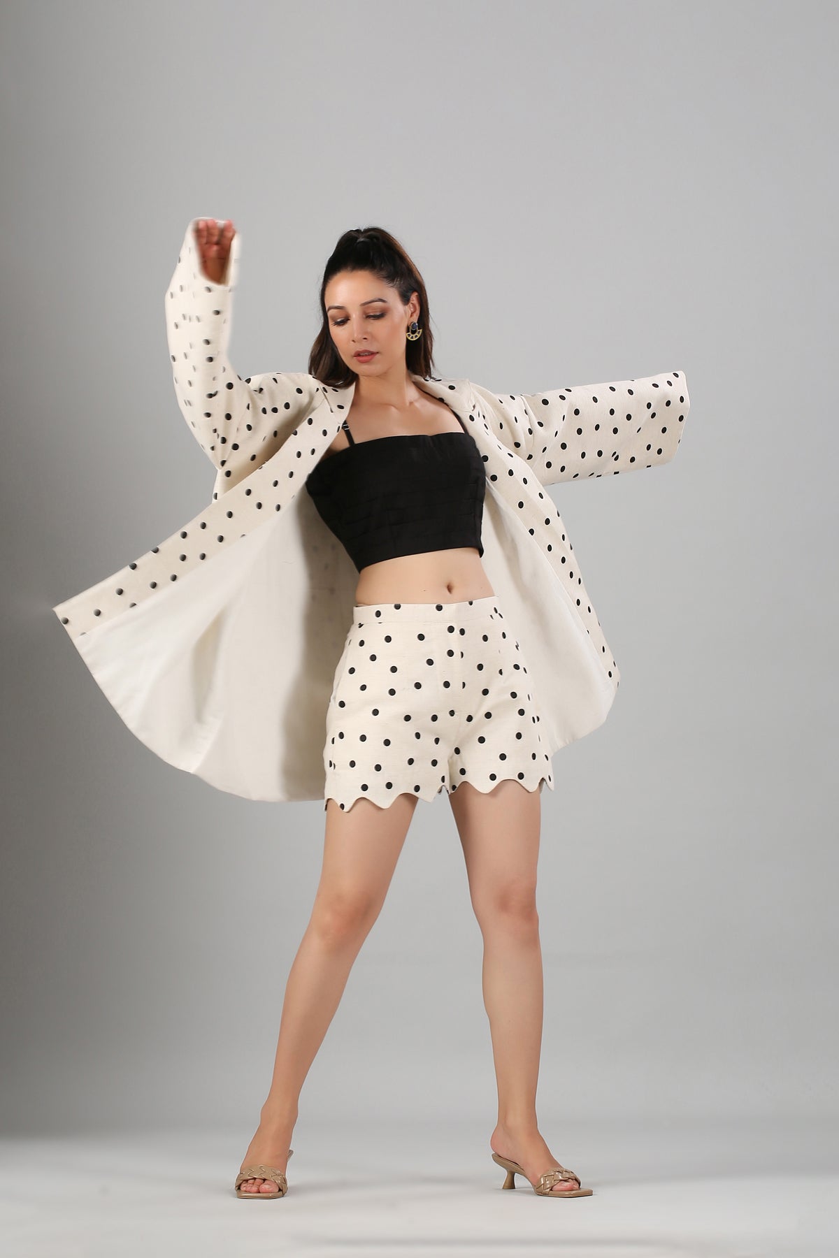 fashionable two piece suit for ladies cream polka dot blazer with matching scalloped shorts and black crop top