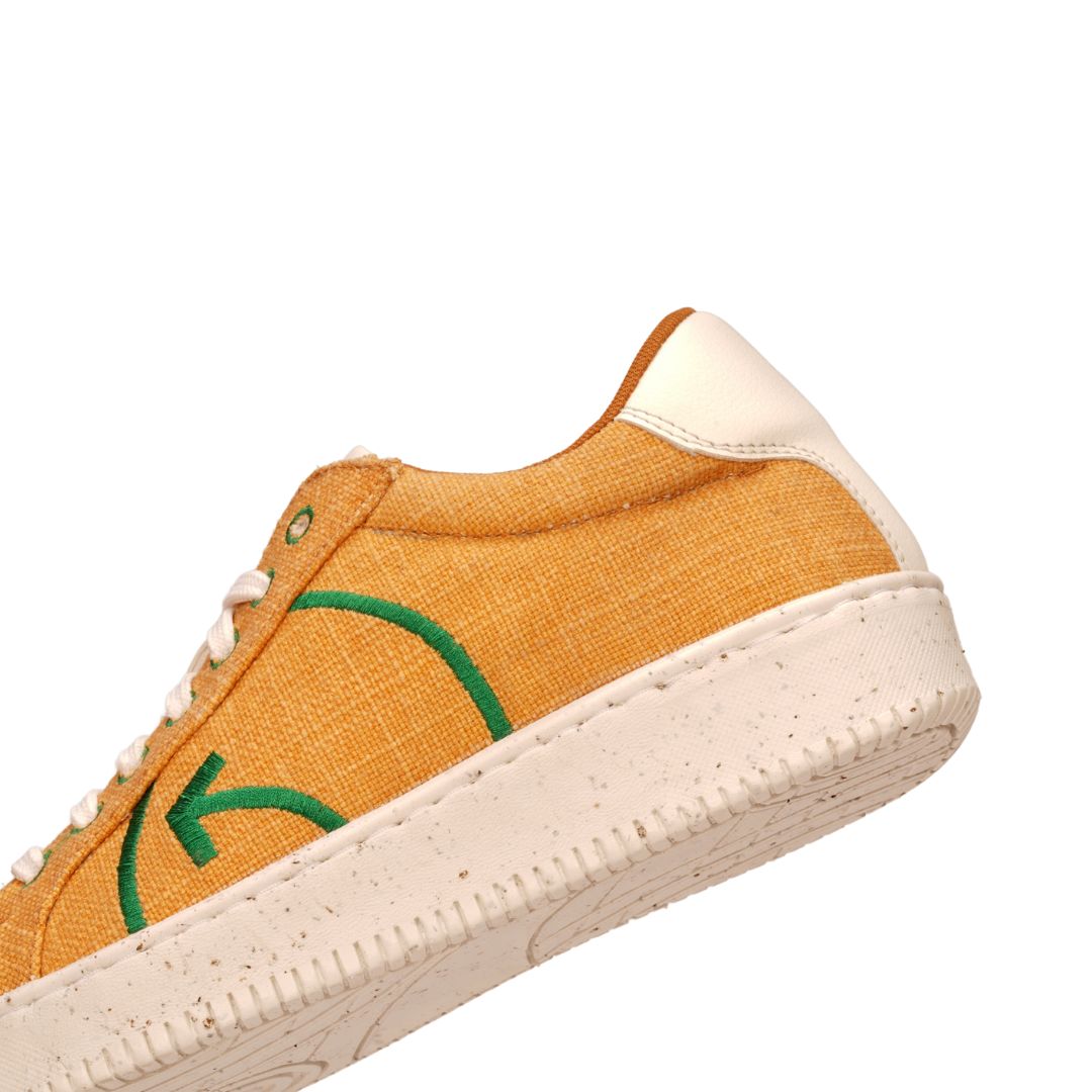 Trendy fashionable yellow casual sneakers with unique design and comfortable fit