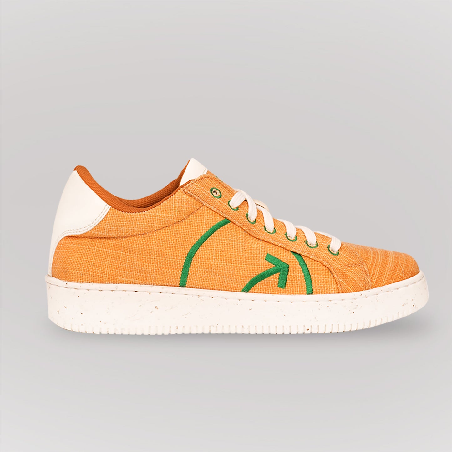 Fashionable yellow casual sneakers with green details and eco-friendly materials