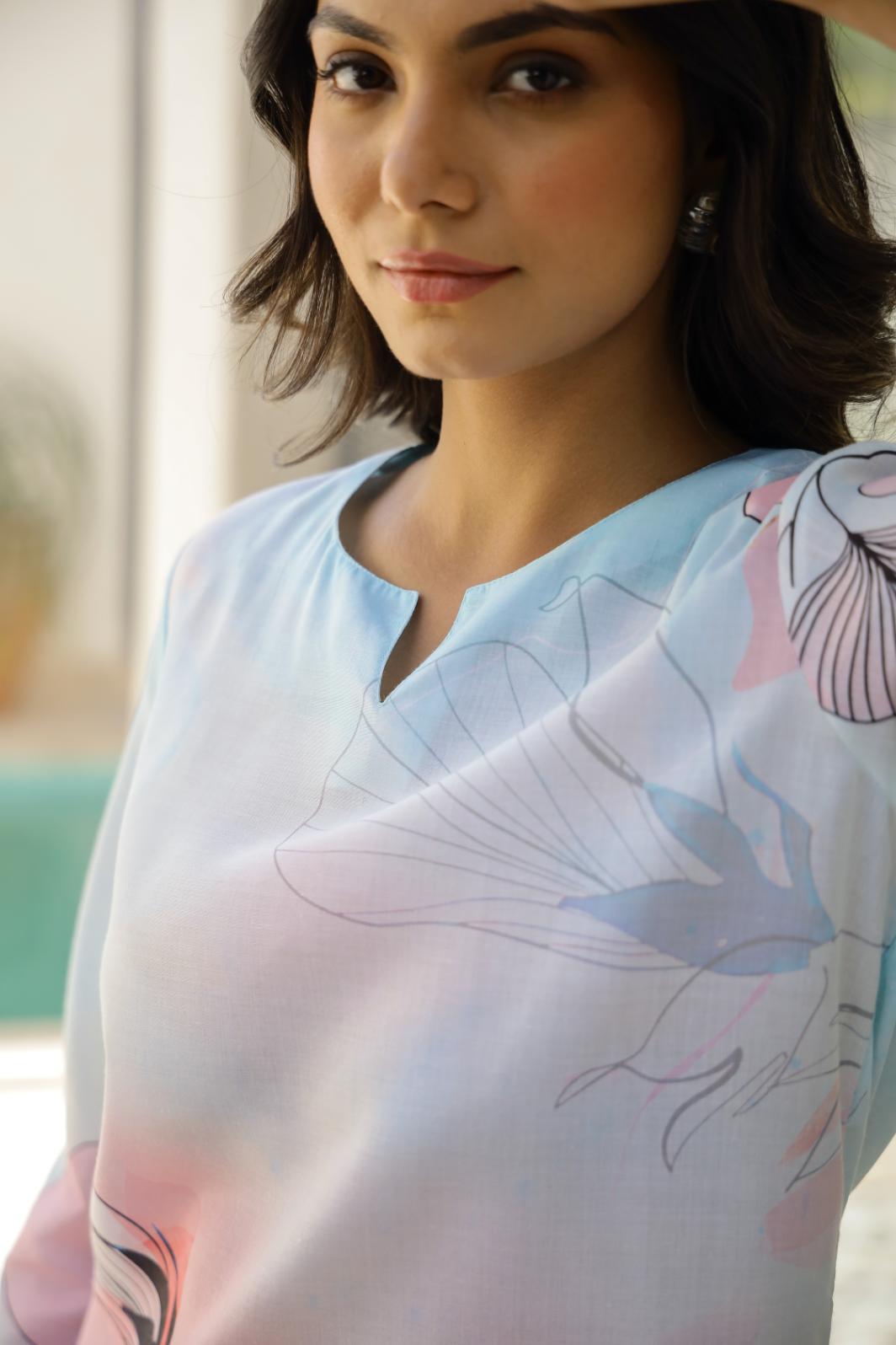 Model wearing a stylish floral cotton co ord set for women featuring soft pastel colors and elegant design.