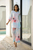 Floral cotton co ord set for women in light blue with pink floral prints, perfect for casual outings.