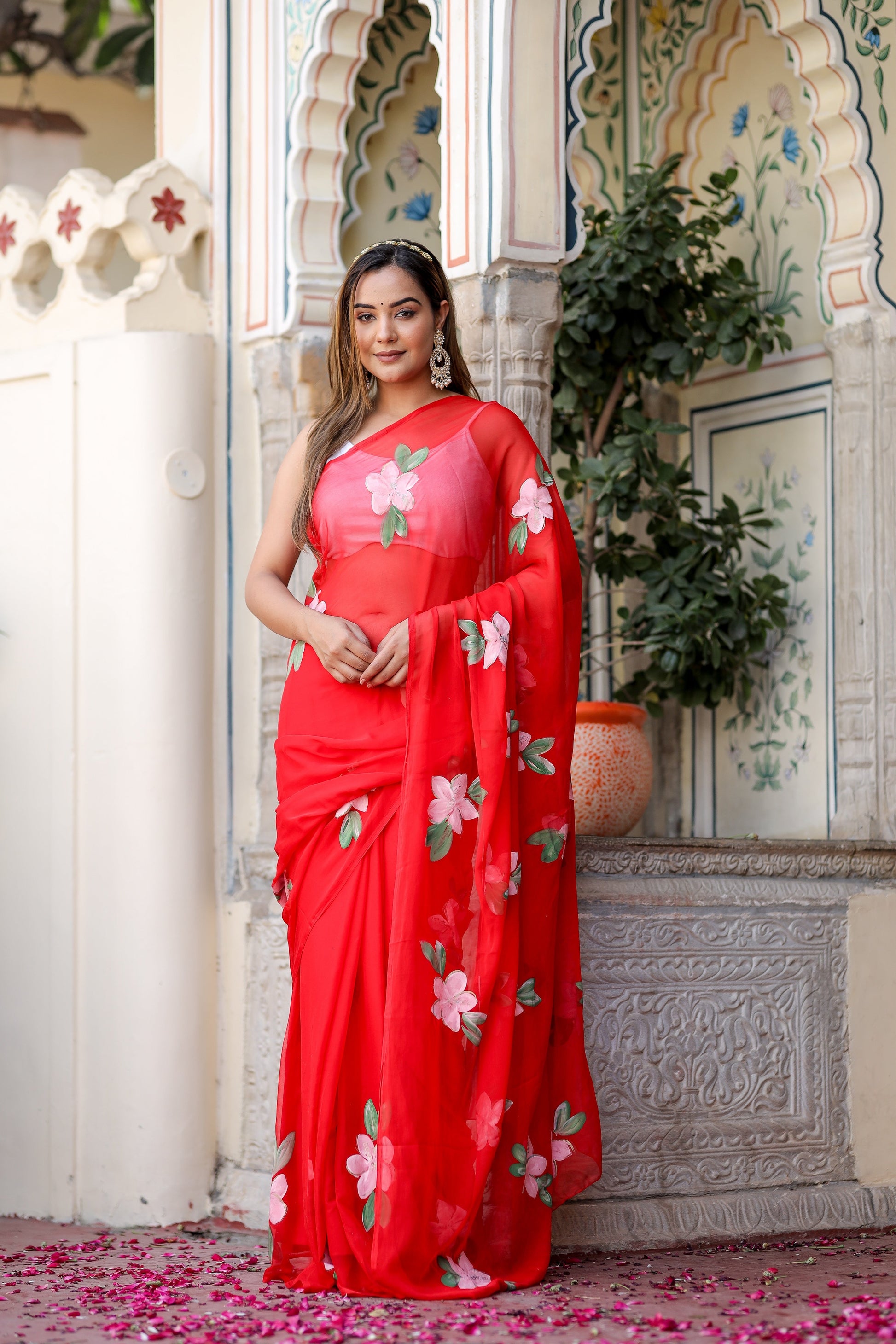 Elegant floral designer chiffon saree in red with beautiful floral patterns, perfect for festive occasions