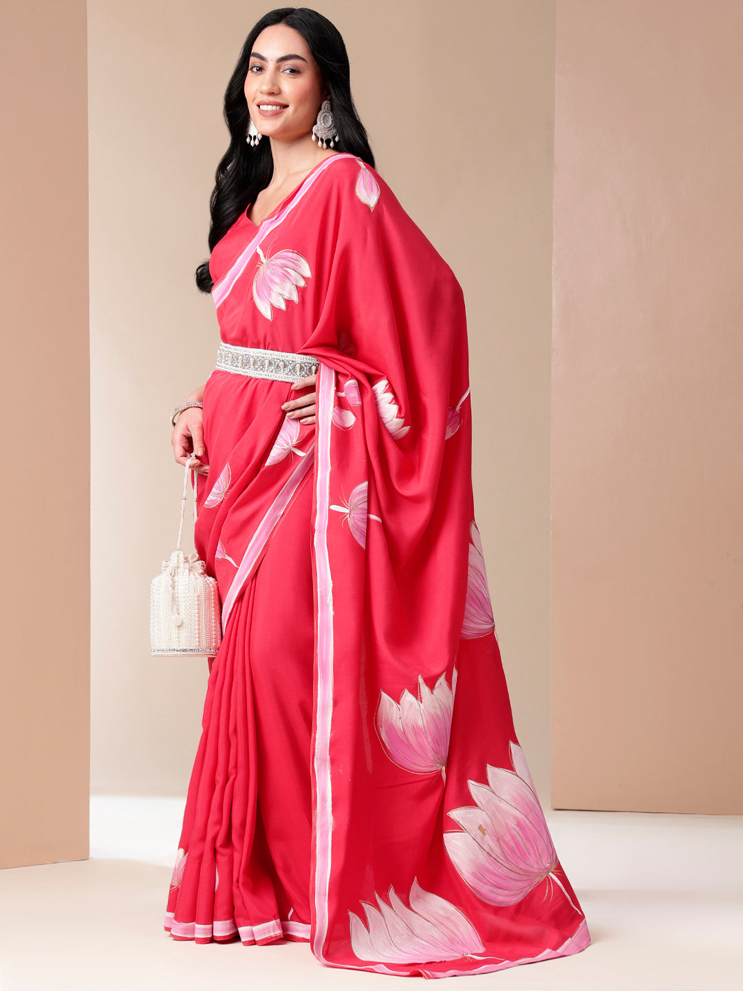 Elegant Stylera floral designer mal mal saree in vibrant pink with floral patterns and decorative border