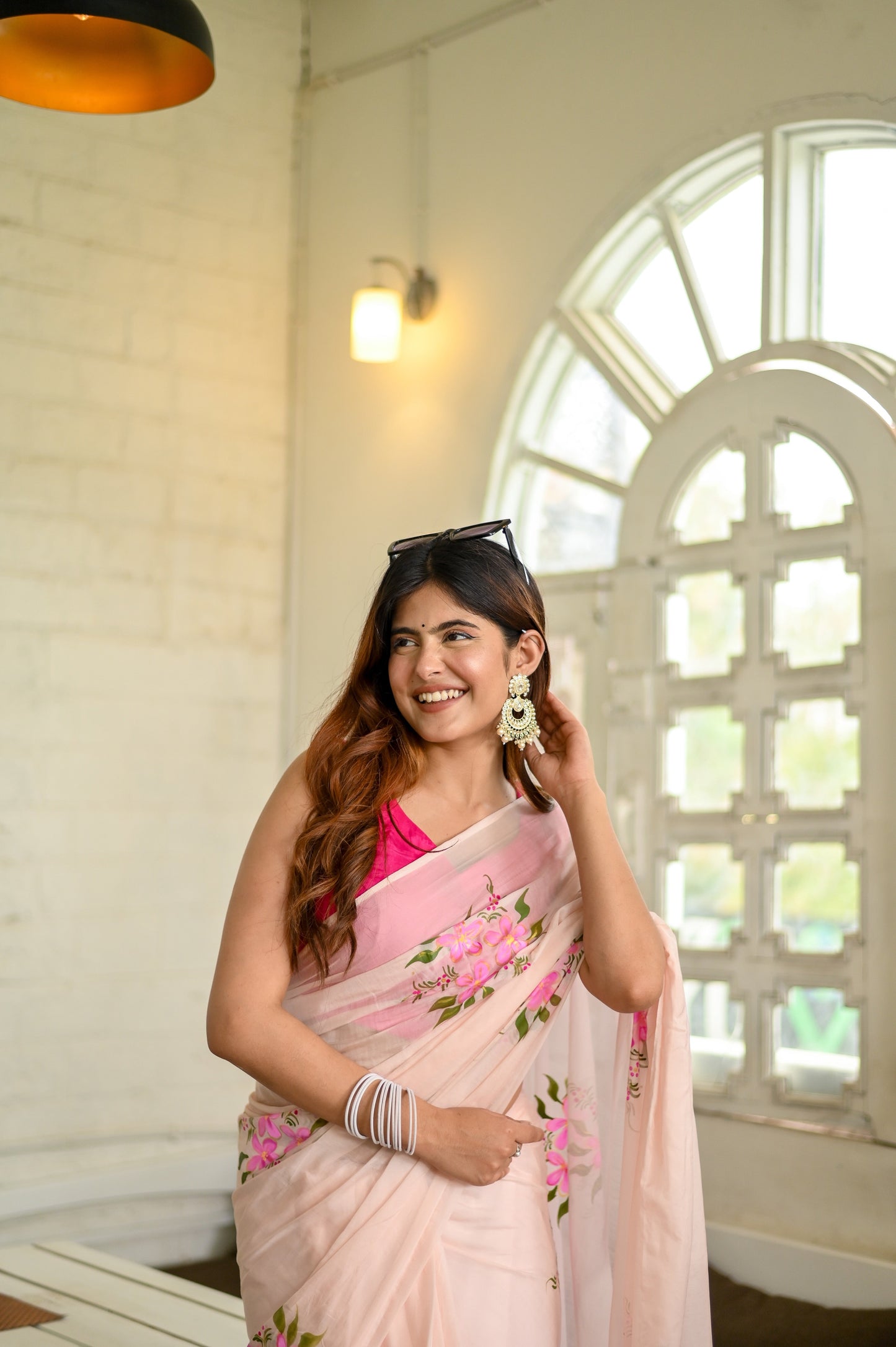 Elegant floral organza saree for women featuring delicate pink floral prints