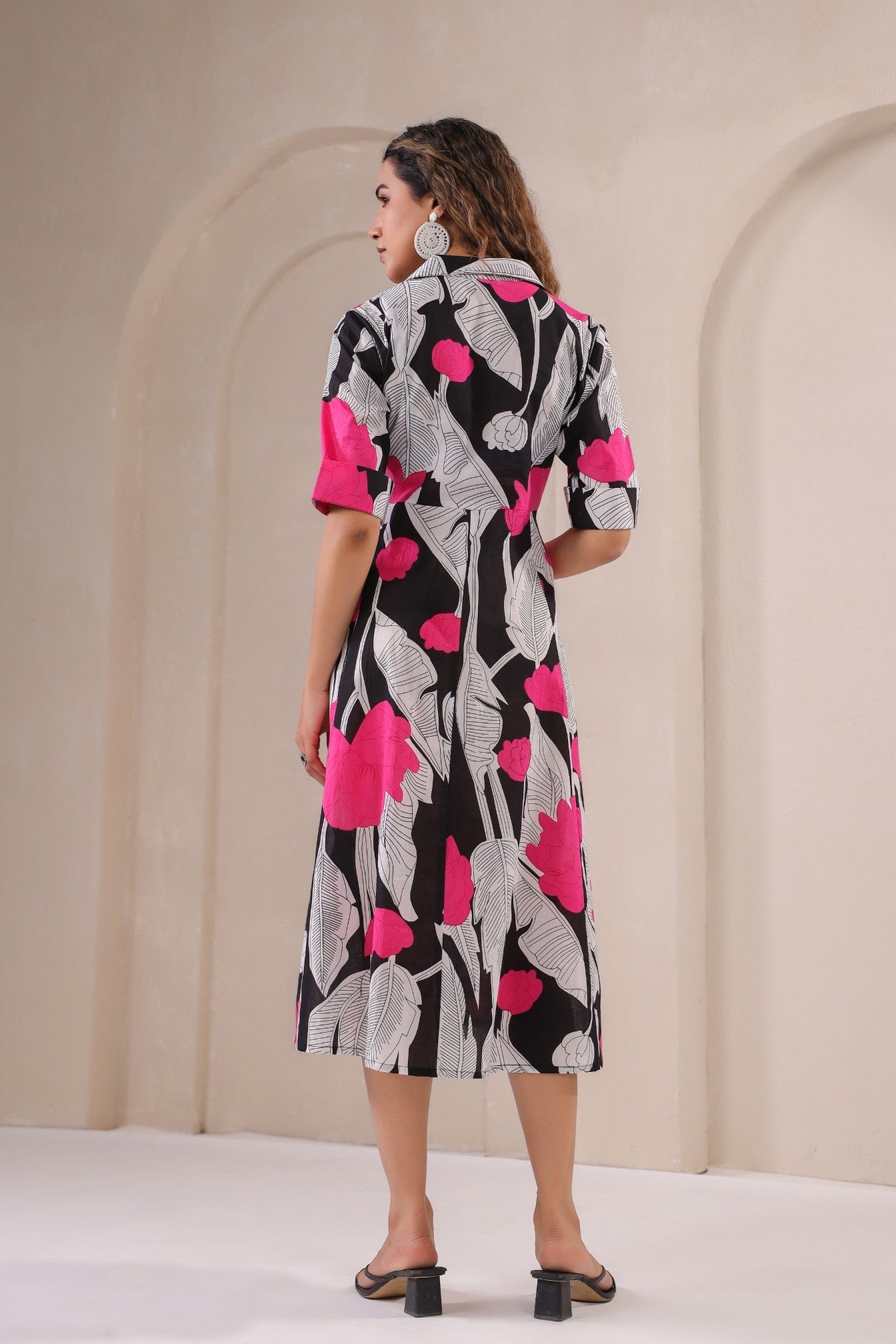Stylera floral print midi dress featuring a vibrant design with pink and black colors