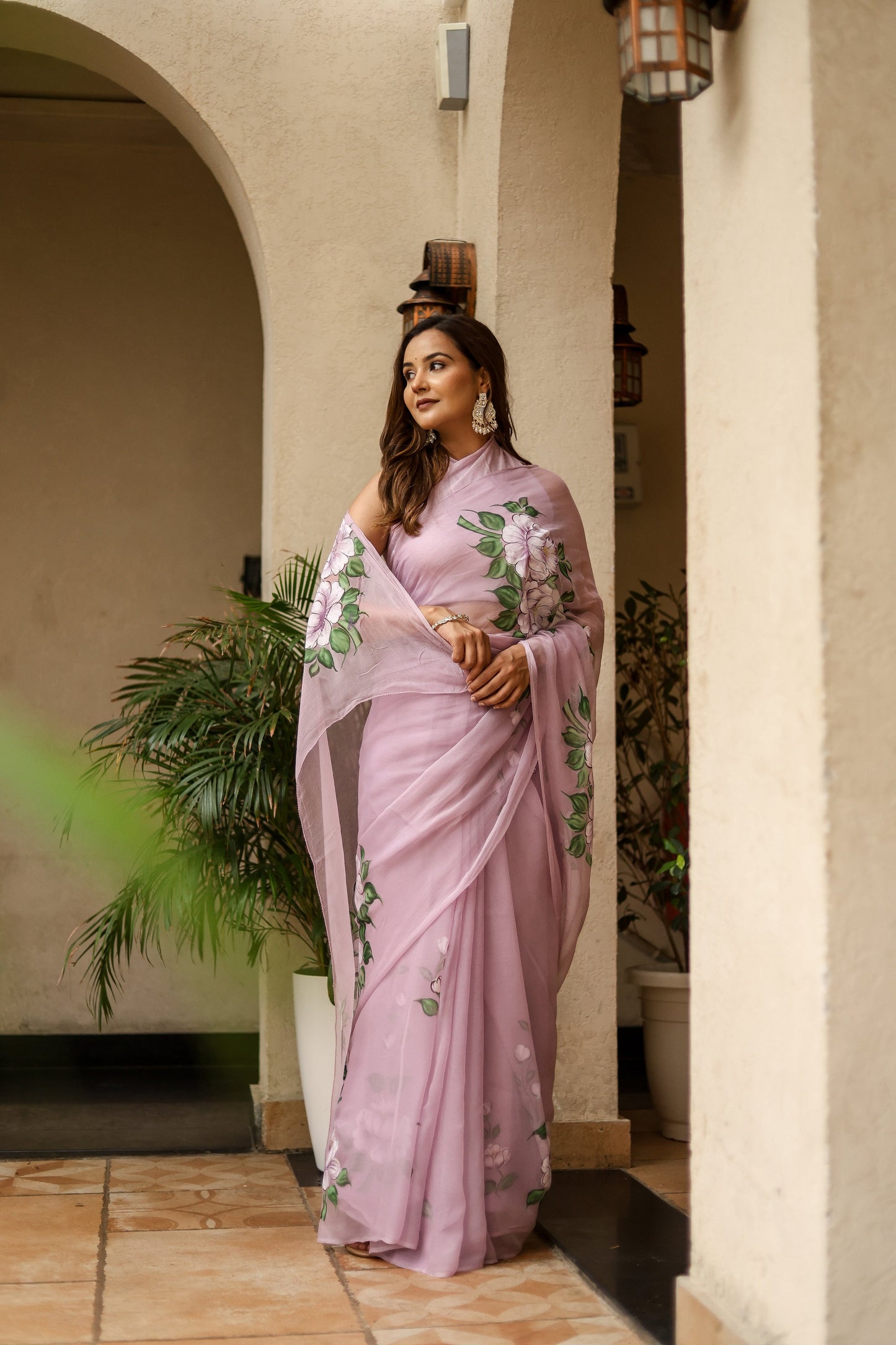 Elegant floral statement saree in light purple with intricate floral designs for special occasions
