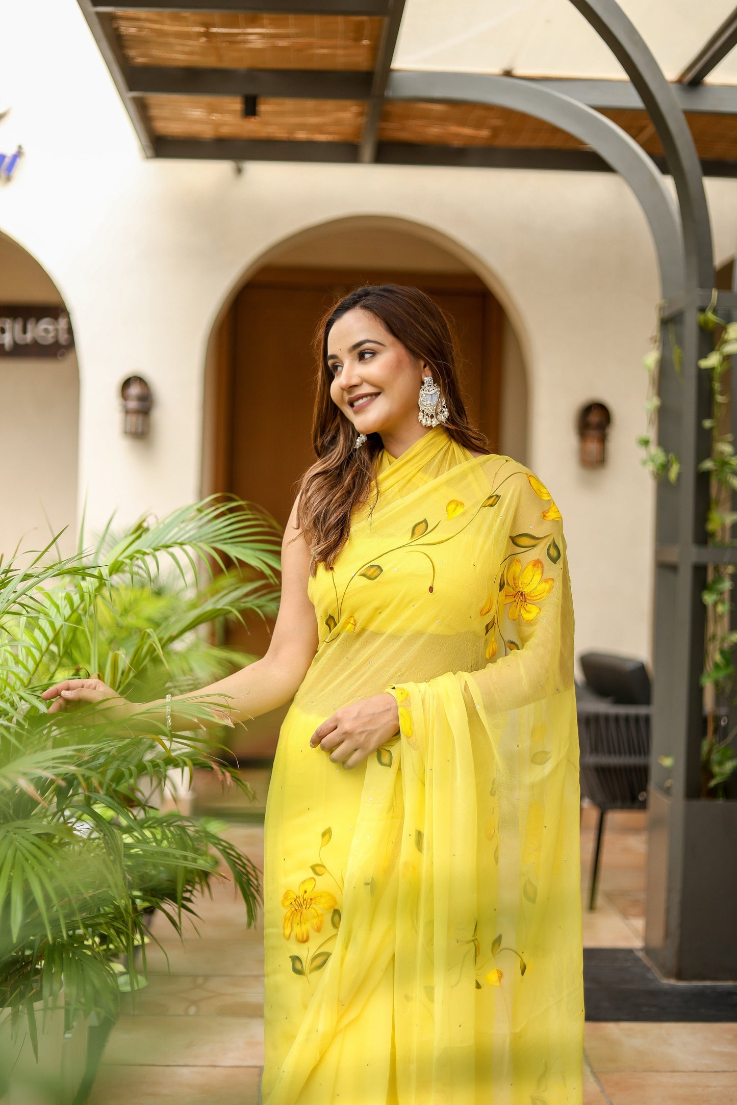 Elegant floral viscose chiffon saree with mukaish work in vibrant yellow, perfect for festive occasions