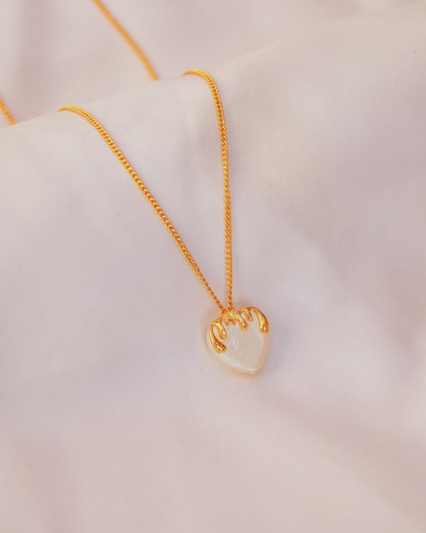 Stylera delicate gold heart necklace for women with pearly white heart pendant on fine gold chain