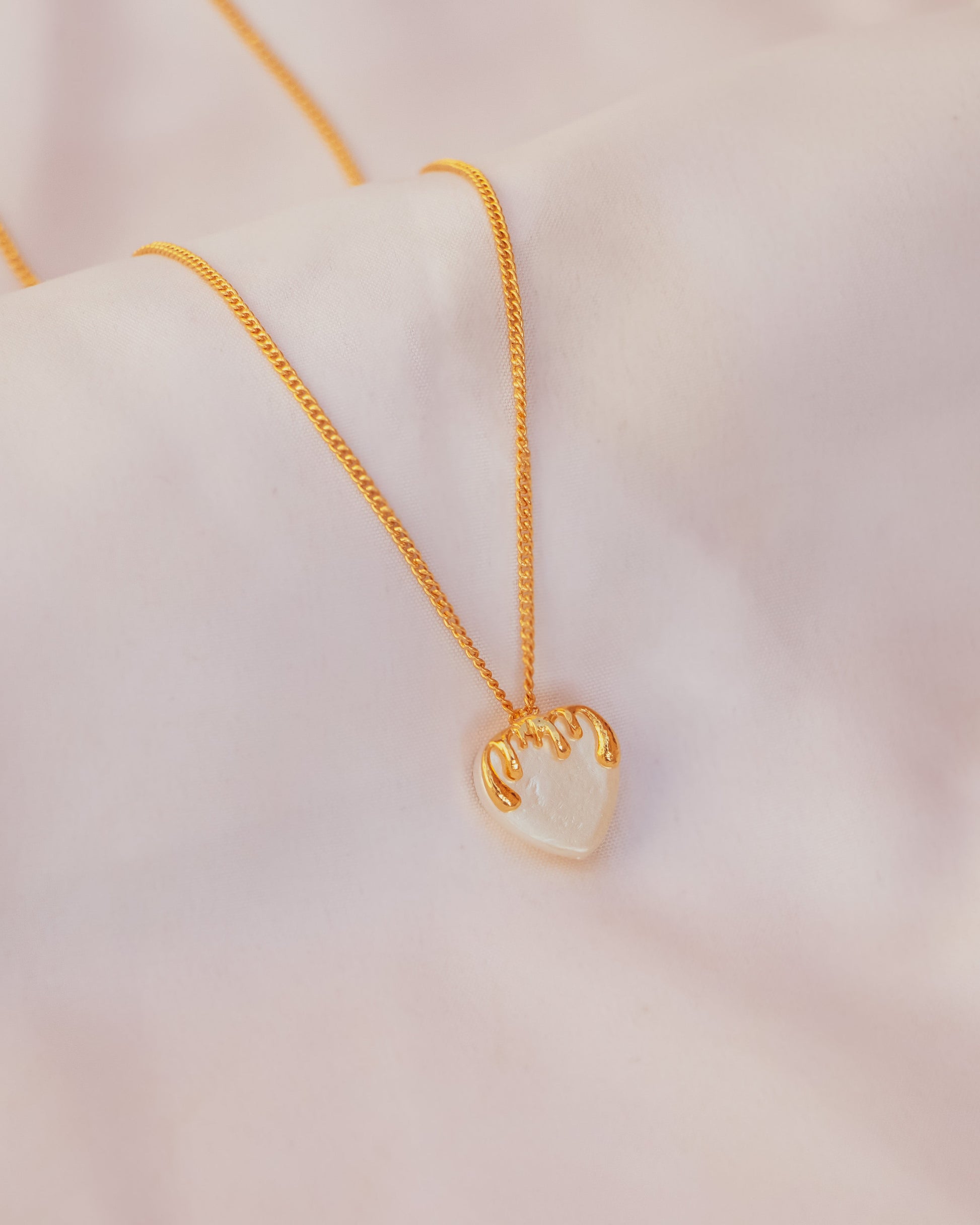 Stylera delicate gold heart necklace for women with pearly white heart pendant on fine gold chain